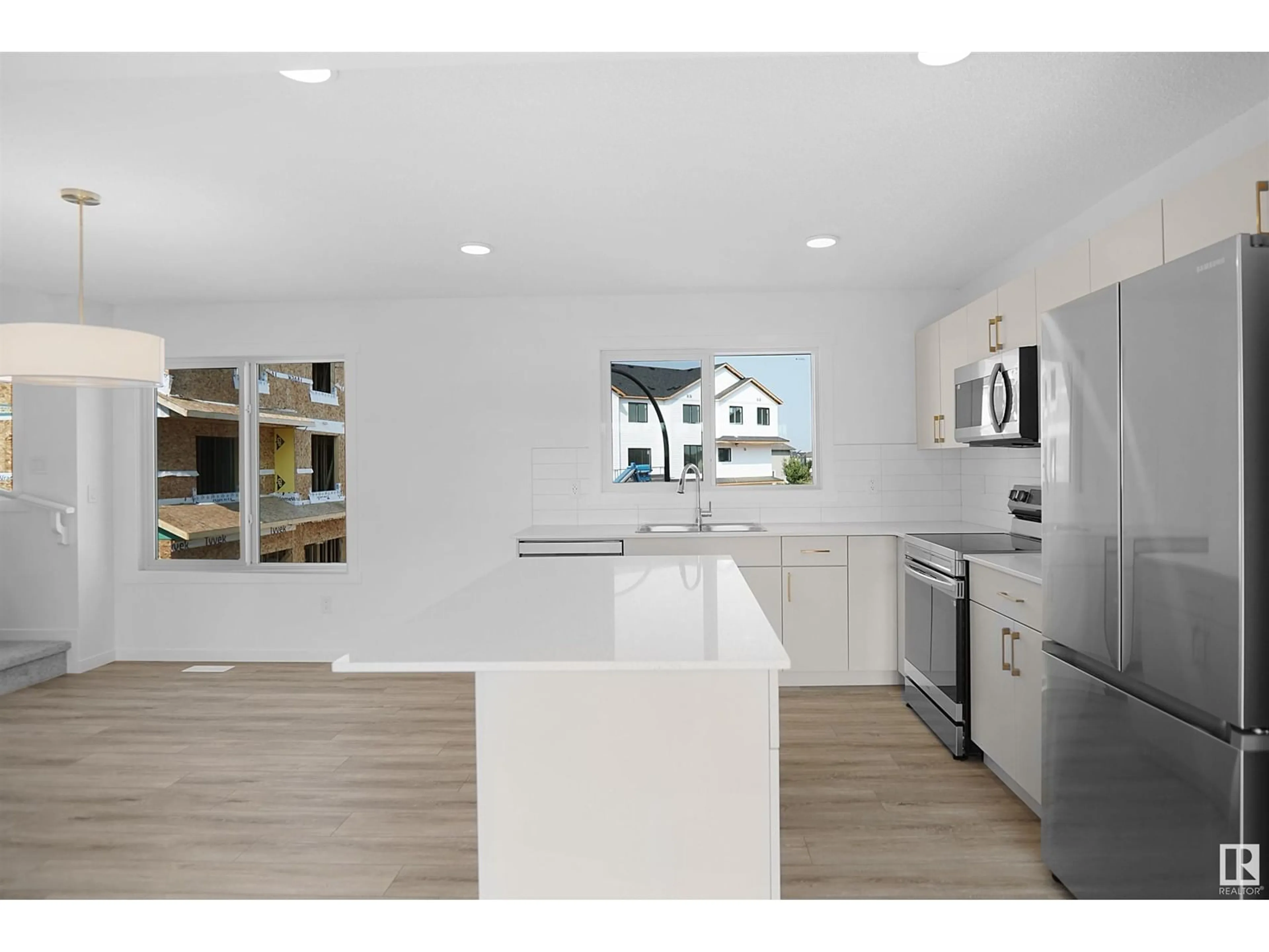 Open concept kitchen, unknown for #66 525 Secord BV NW, Edmonton Alberta T5T7V3