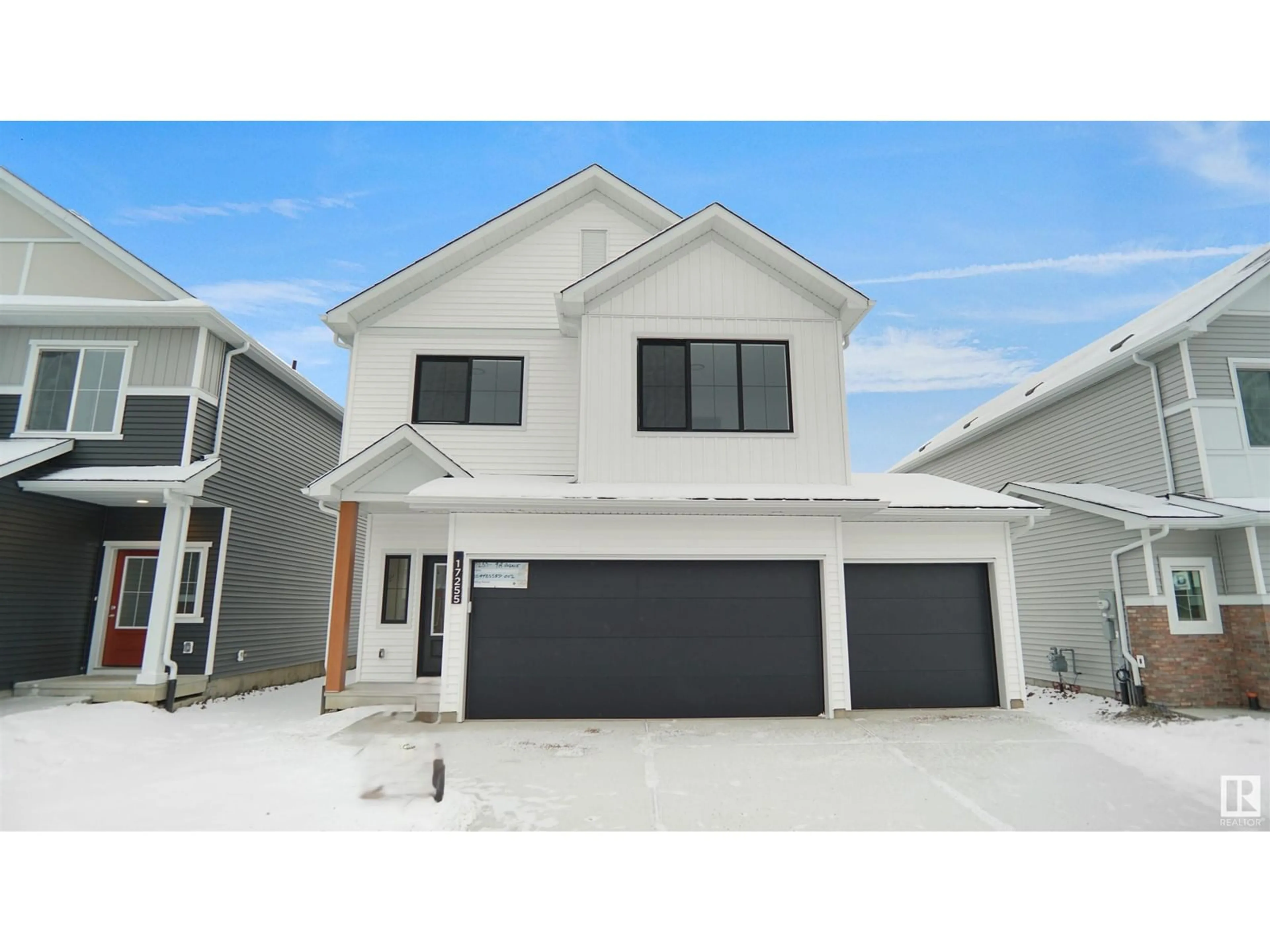 Home with vinyl exterior material, street for 17231 9B AV SW, Edmonton Alberta T6W3V5