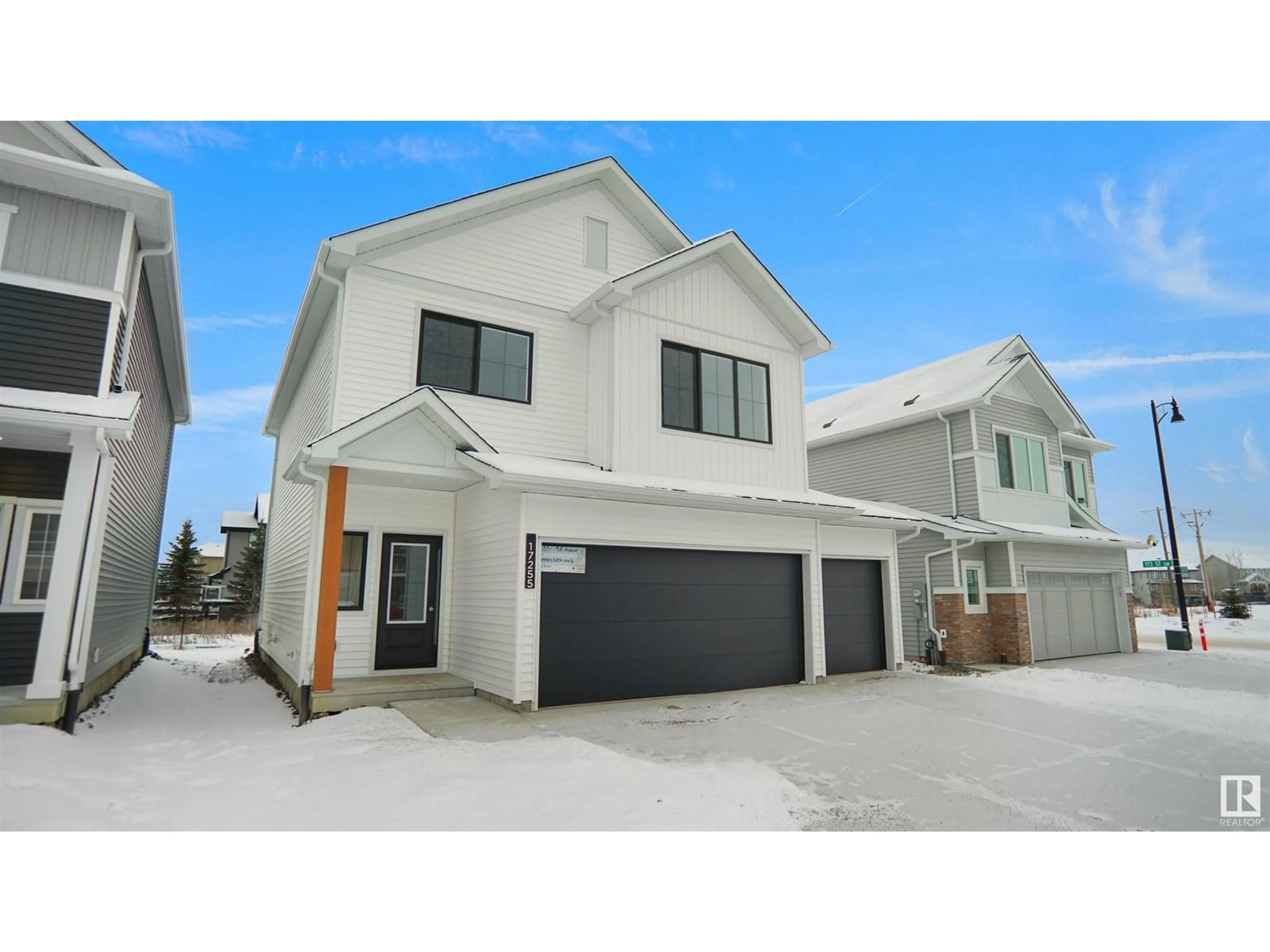 Home with vinyl exterior material, street for 17231 9B AV SW, Edmonton Alberta T6W3V5