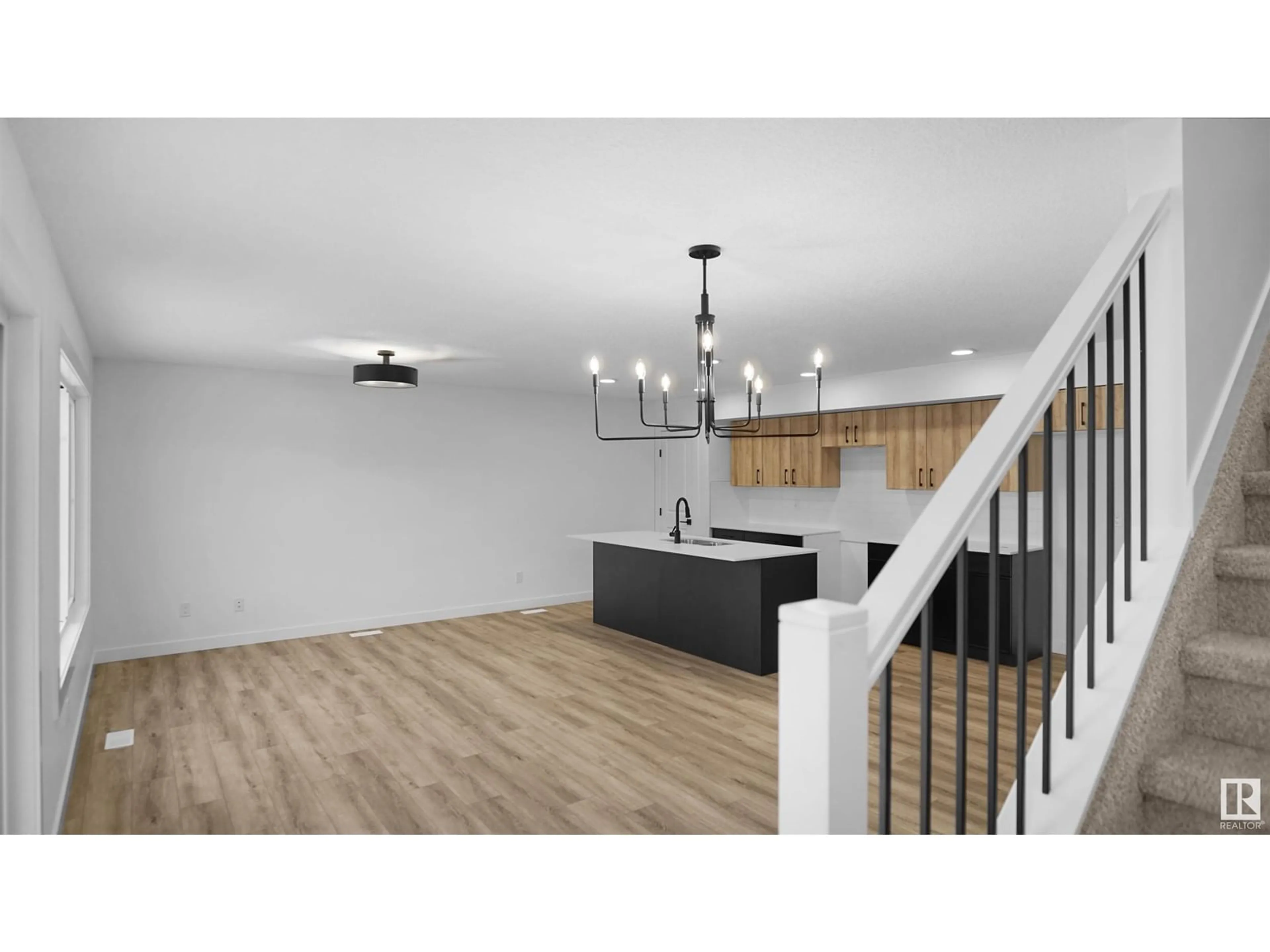 Open concept kitchen, wood/laminate floor for 17231 9B AV SW, Edmonton Alberta T6W3V5