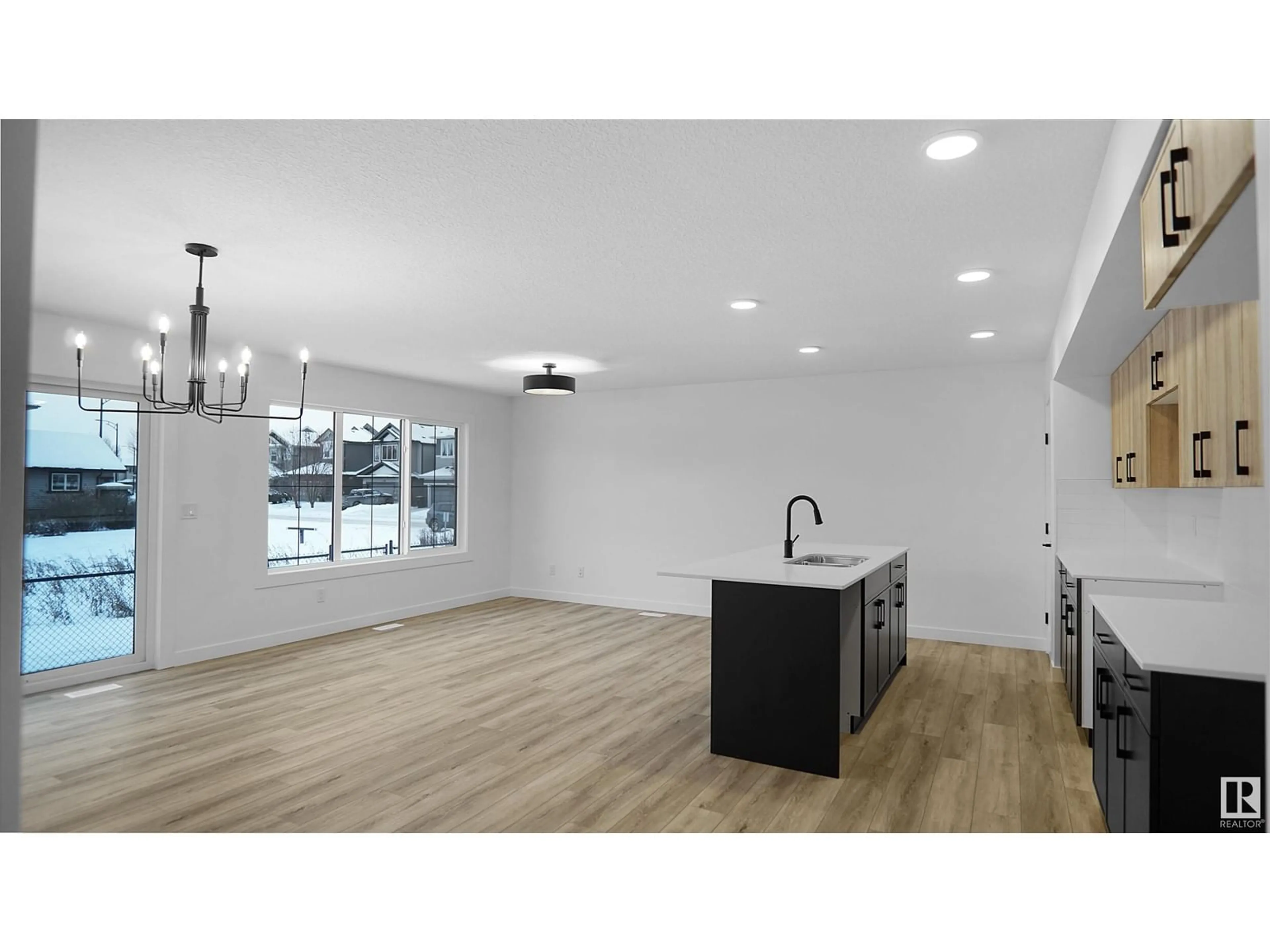 Open concept kitchen, wood/laminate floor for 17231 9B AV SW, Edmonton Alberta T6W3V5