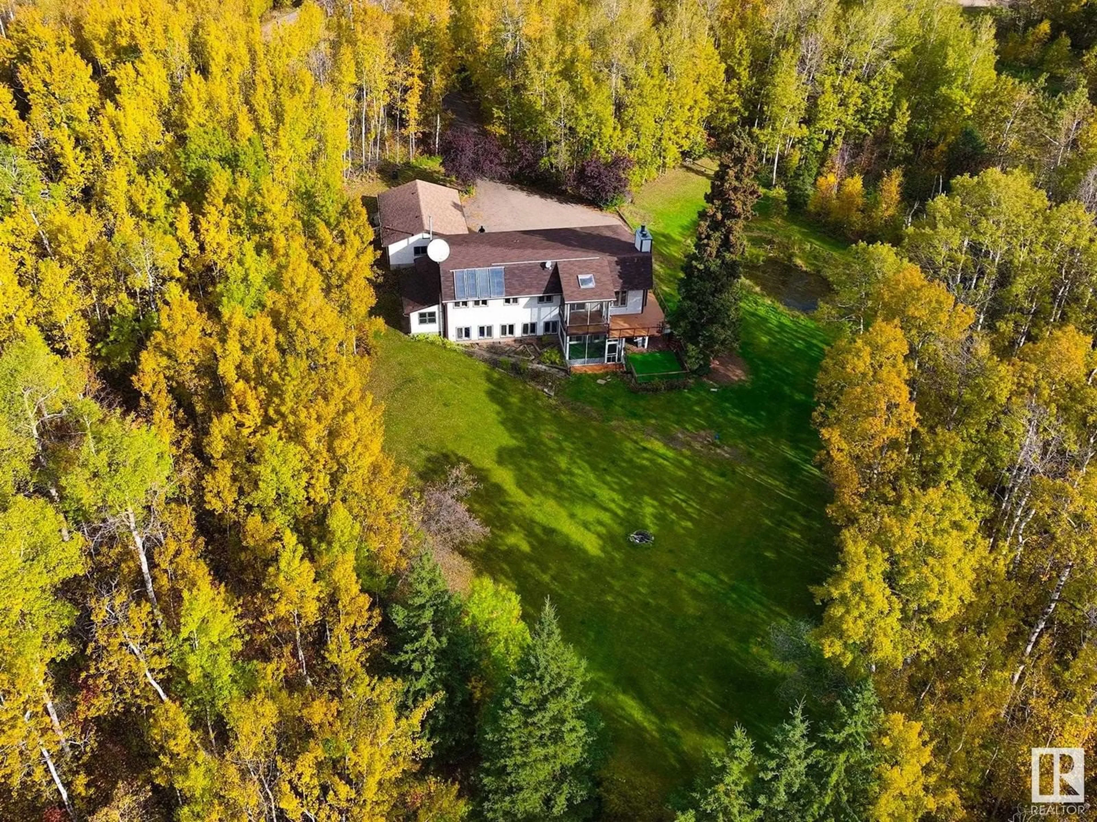 A pic from outside/outdoor area/front of a property/back of a property/a pic from drone, forest/trees view for 52152 RGE ROAD 225, Rural Strathcona County Alberta T8C1C6