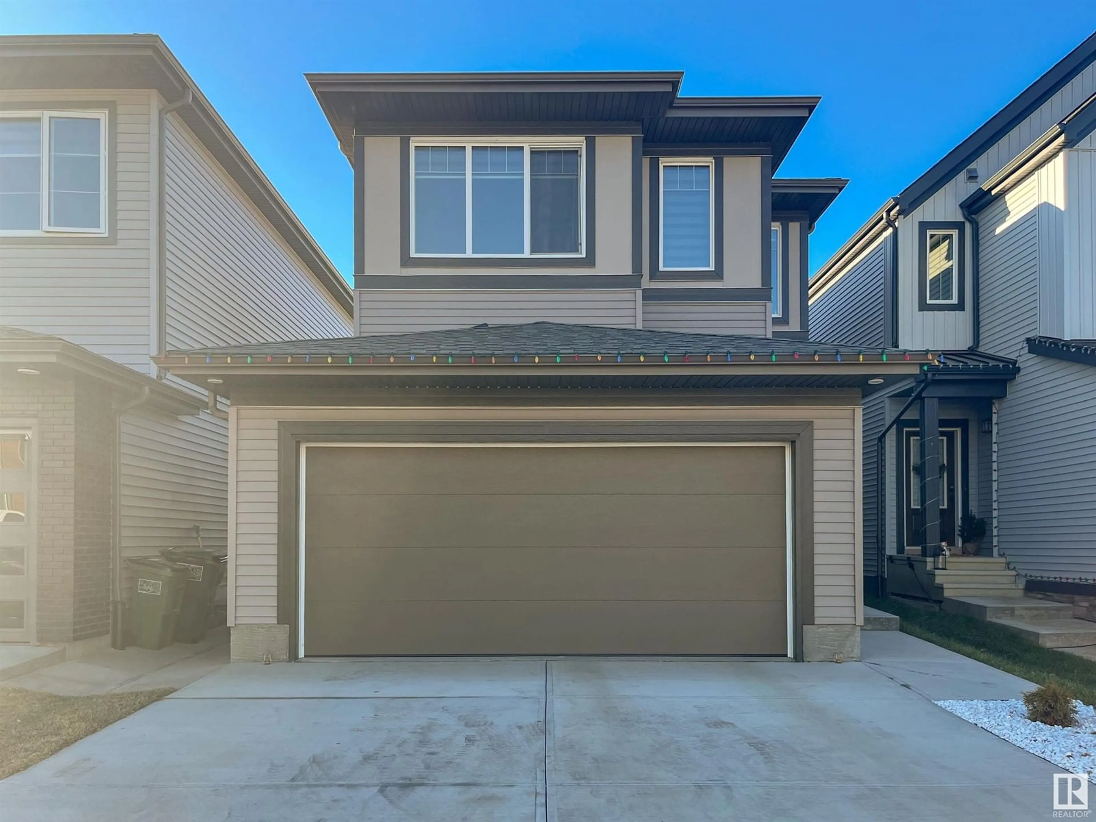 Home with vinyl exterior material, street for 2508 193 ST NW, Edmonton Alberta T6M1L3