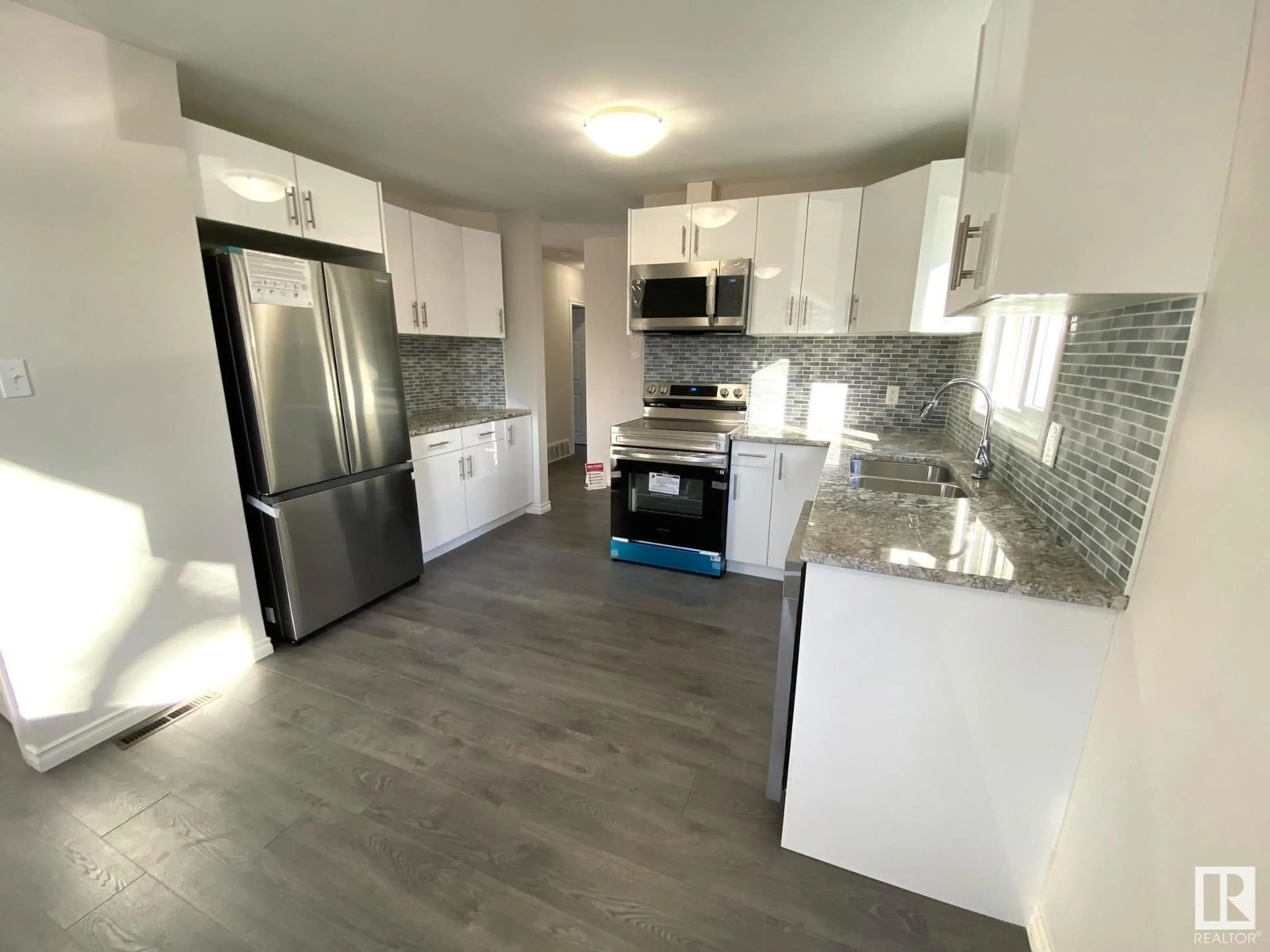 Open concept kitchen, unknown for 12023 93 ST NW, Edmonton Alberta T5G1G7