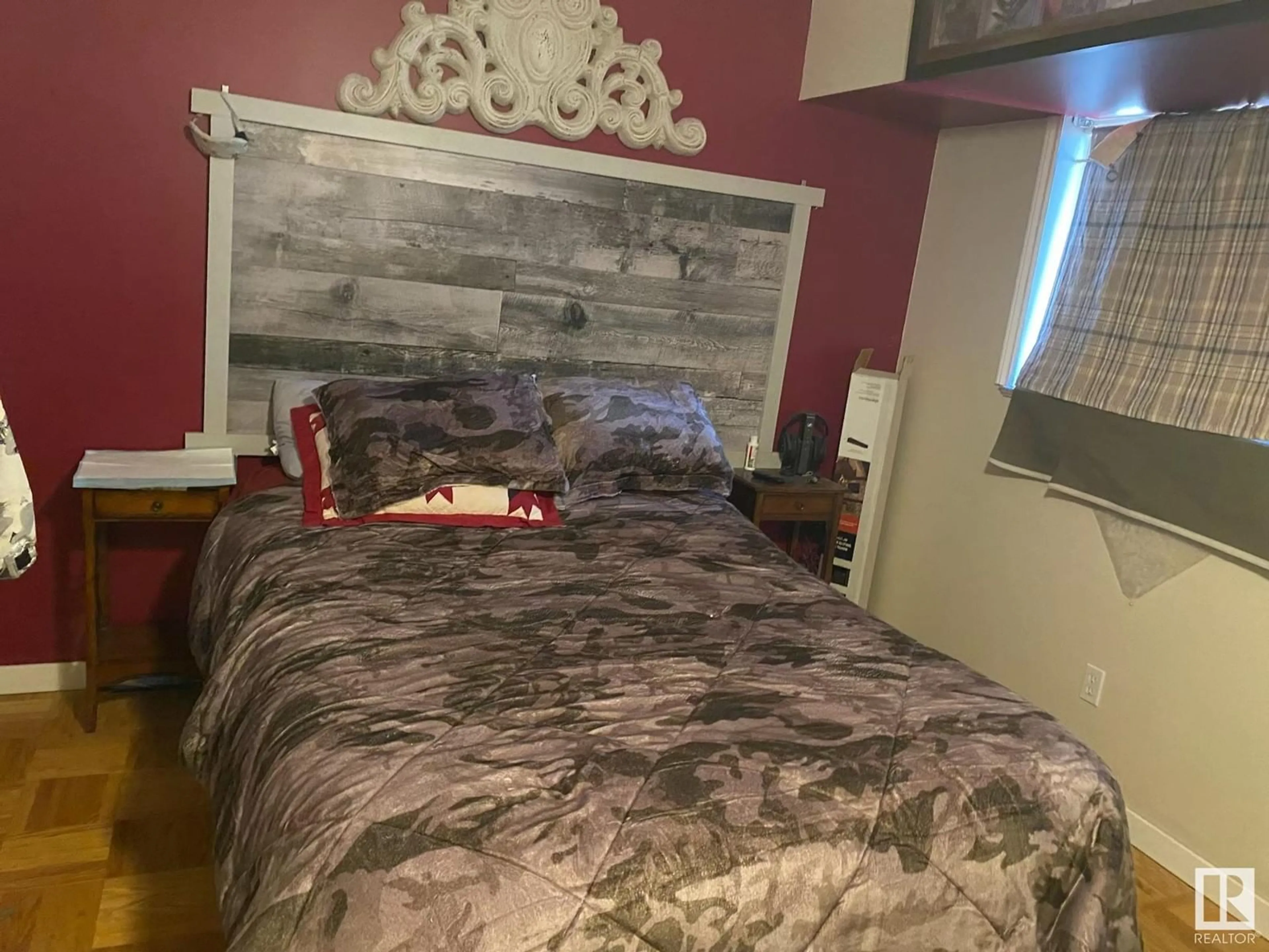 Bedroom with bed, wood/laminate floor for #608 610 King ST S, Spruce Grove Alberta T7X4J9