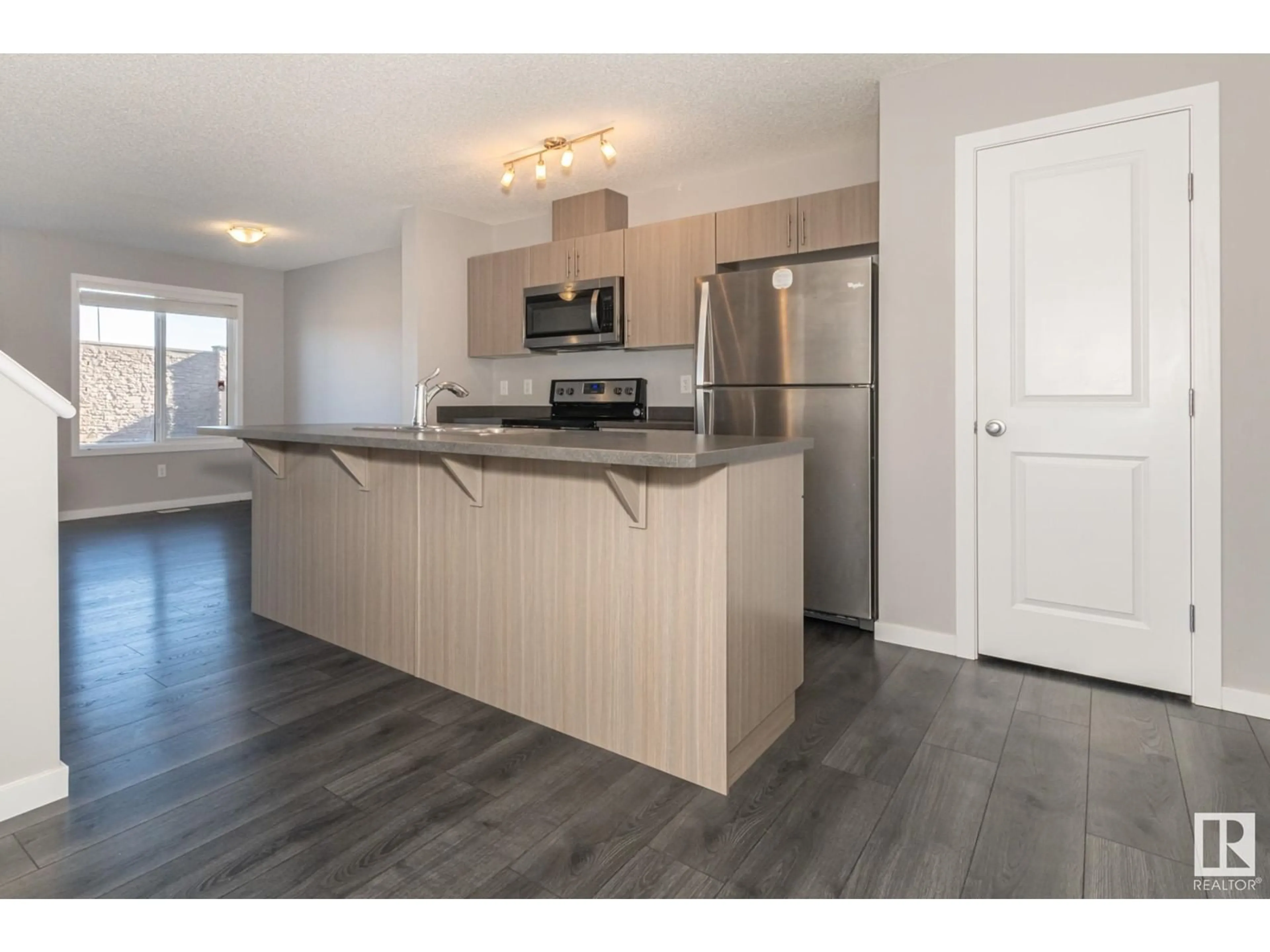 Open concept kitchen, wood/laminate floor for 2590 CASEY WY SW, Edmonton Alberta T6W3N2