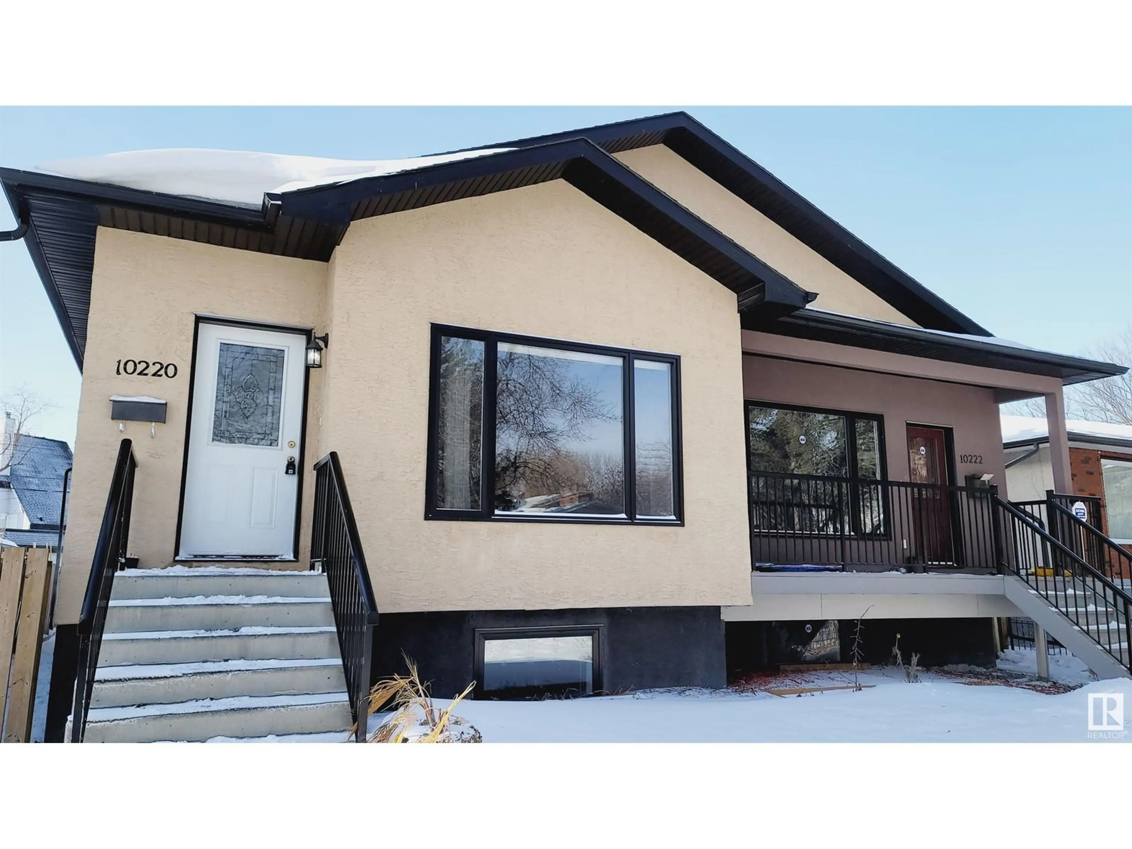 Home with vinyl exterior material, street for 10220 150 ST NW, Edmonton Alberta T5T1P3