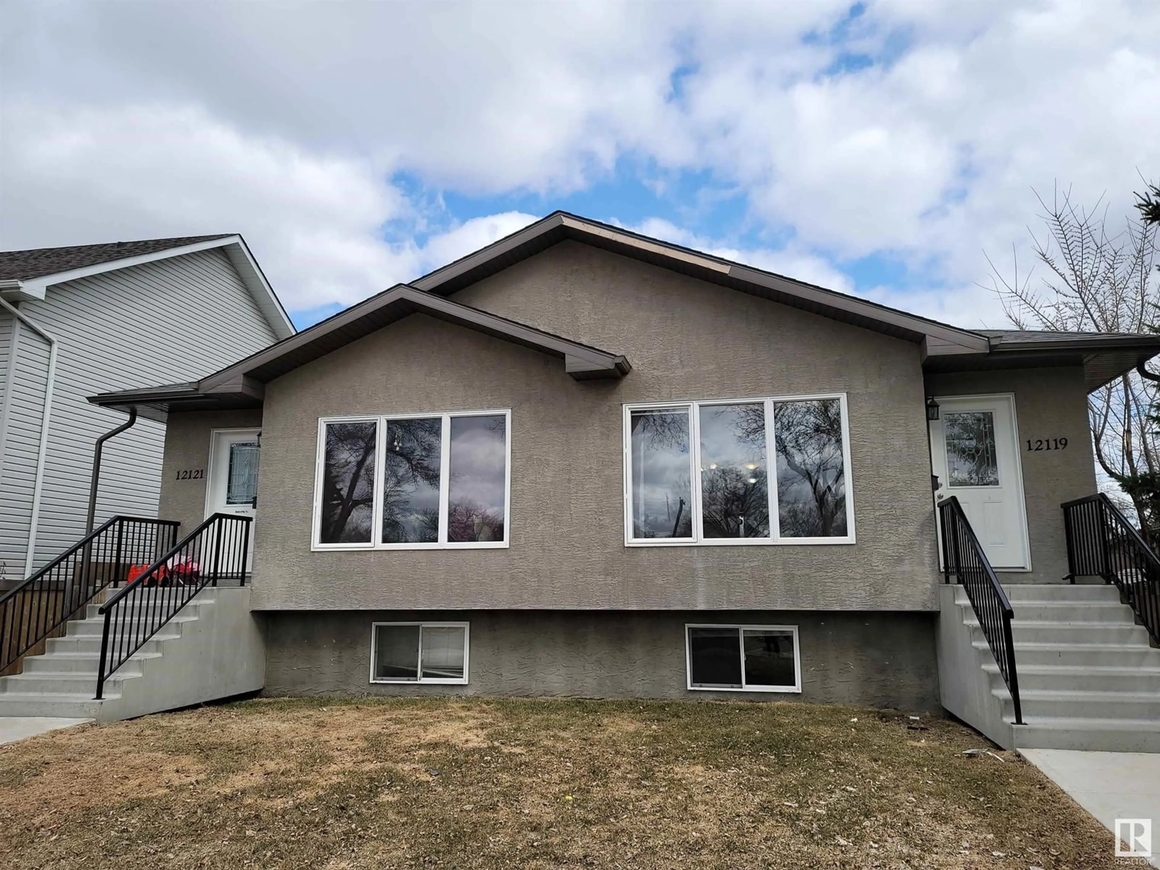 Home with vinyl exterior material, unknown for 12121 124 ST NW, Edmonton Alberta T5L0N1