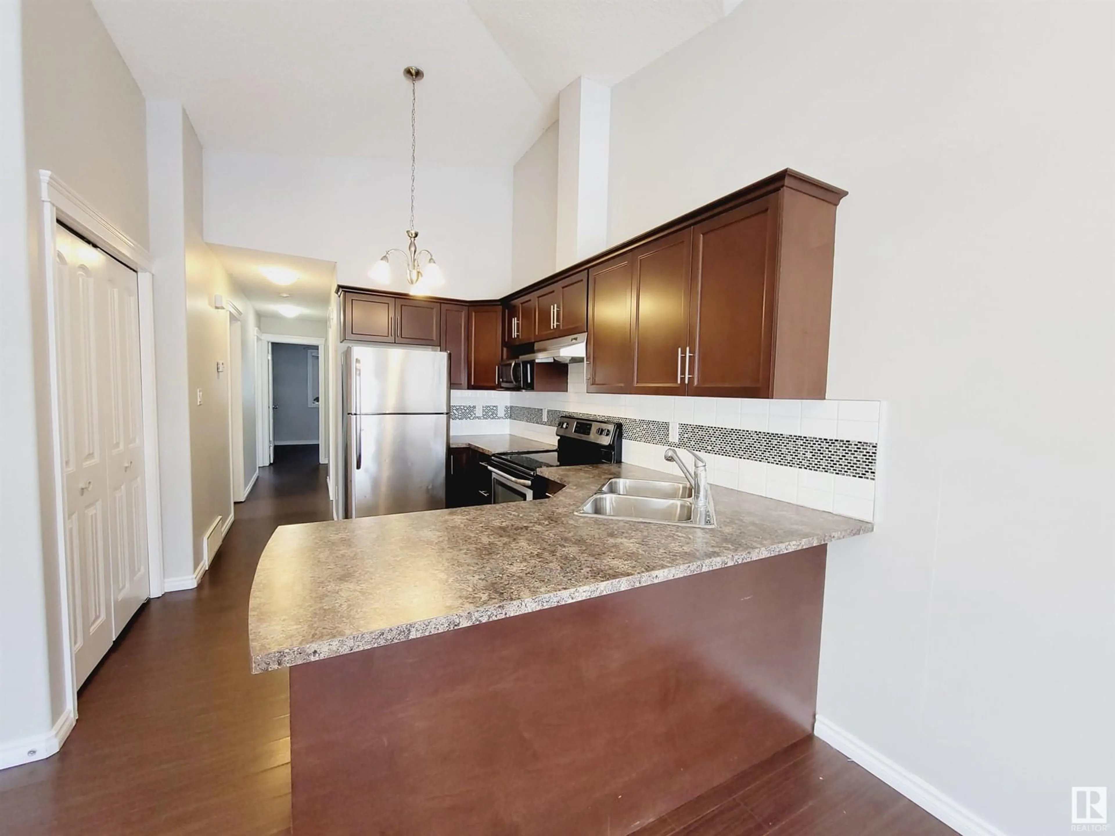 Open concept kitchen, unknown for 12121 124 ST NW, Edmonton Alberta T5L0N1