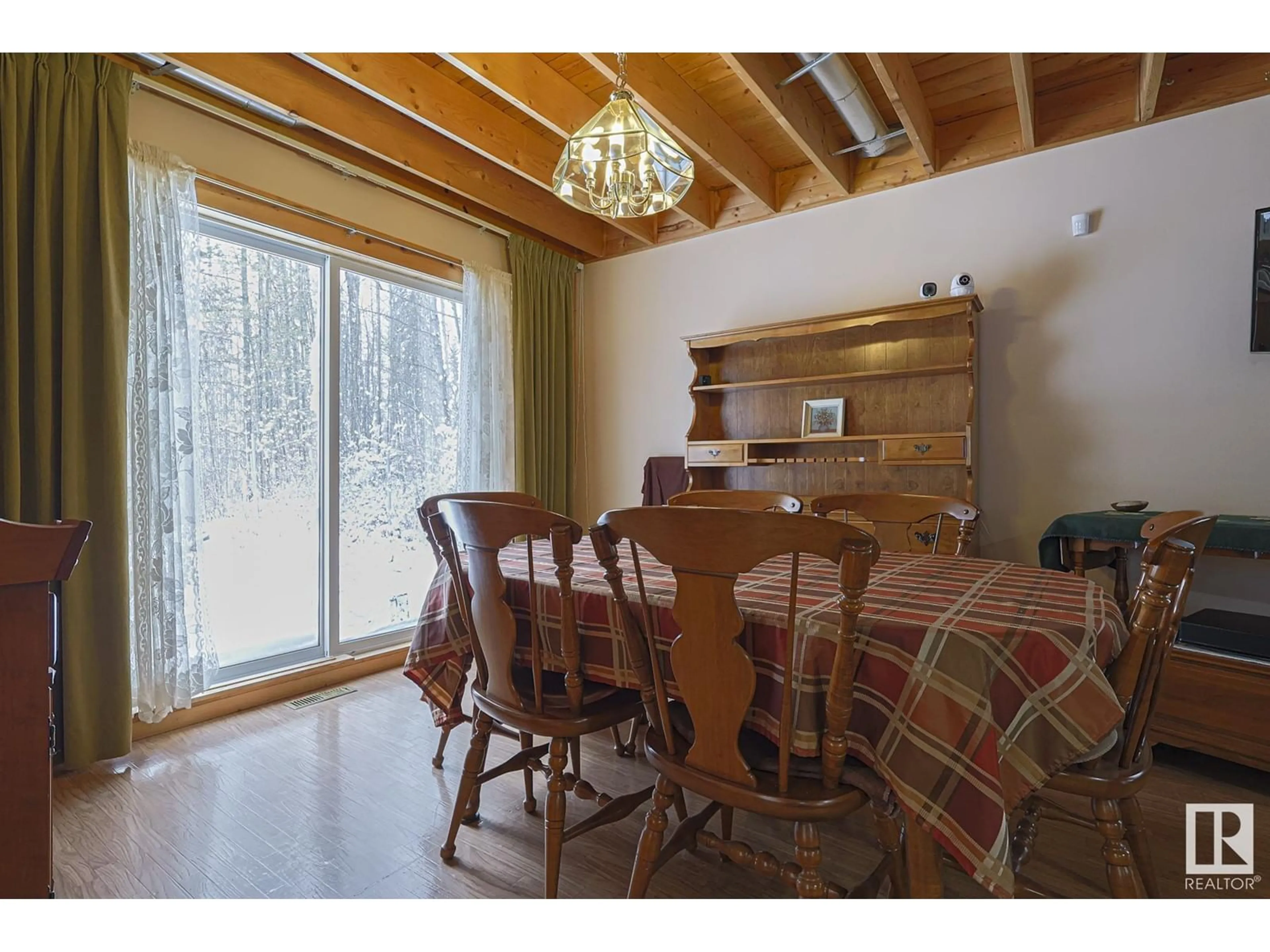 Dining room, wood/laminate floor for 102 2120 TWP RD 565, Rural Lac Ste. Anne County Alberta T0E1V0