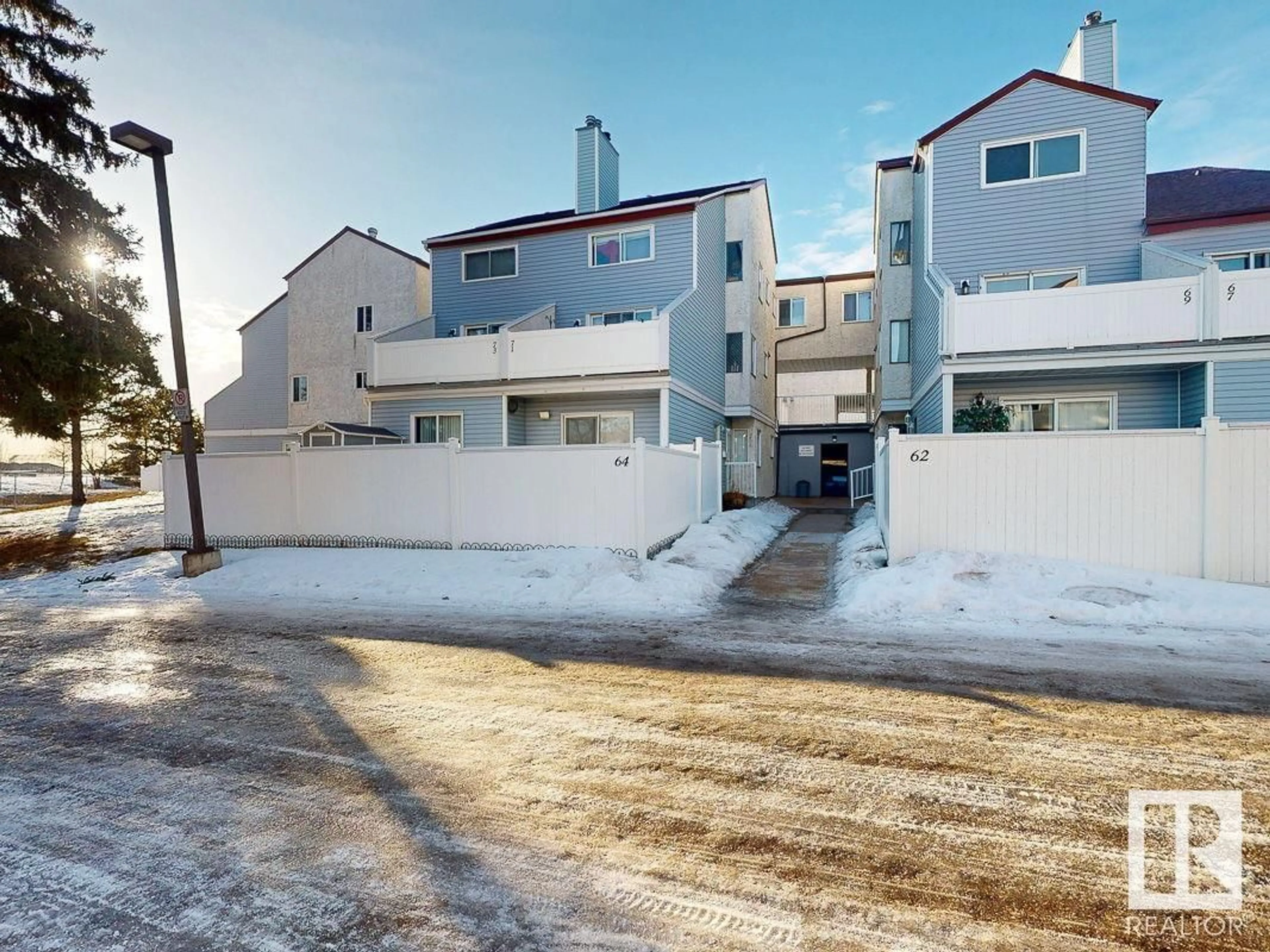 A pic from outside/outdoor area/front of a property/back of a property/a pic from drone, street for 64 LANCASTER TC NW, Edmonton Alberta T5X5S4