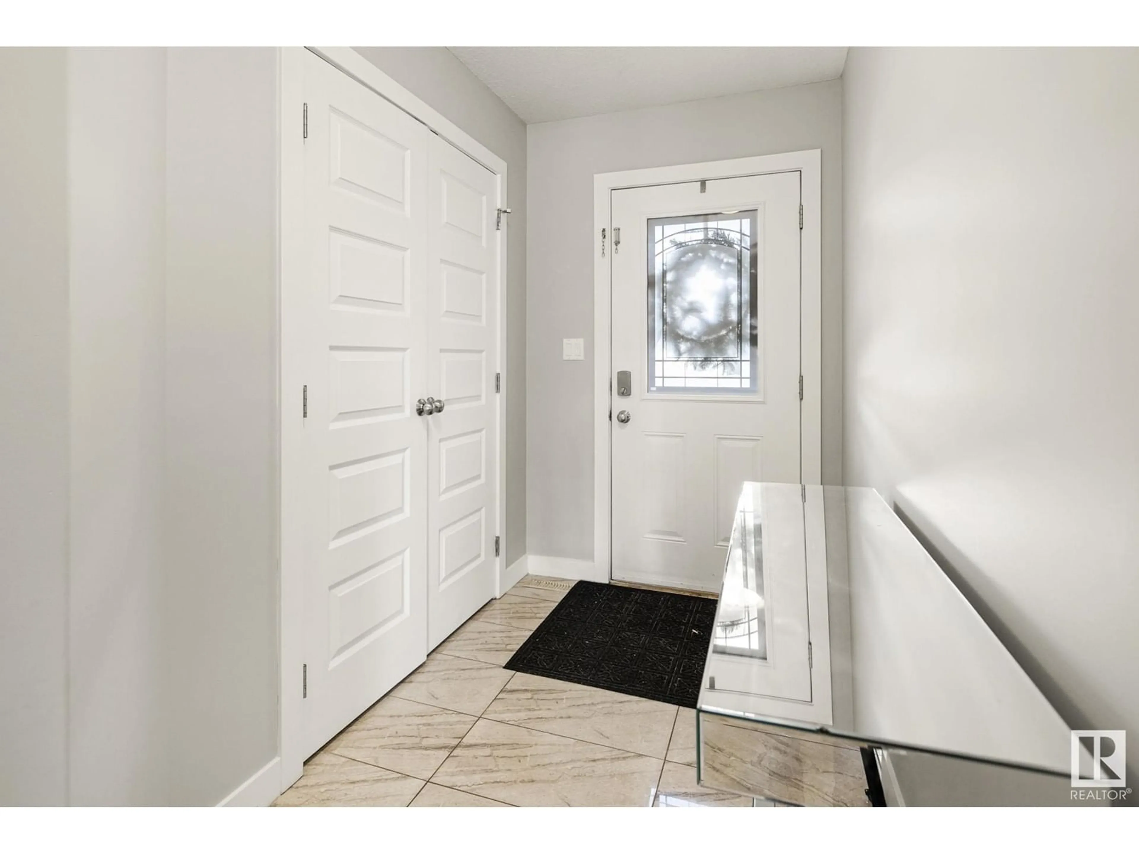 Indoor entryway for 5951 167C AV NW, Edmonton Alberta T5Y0P4