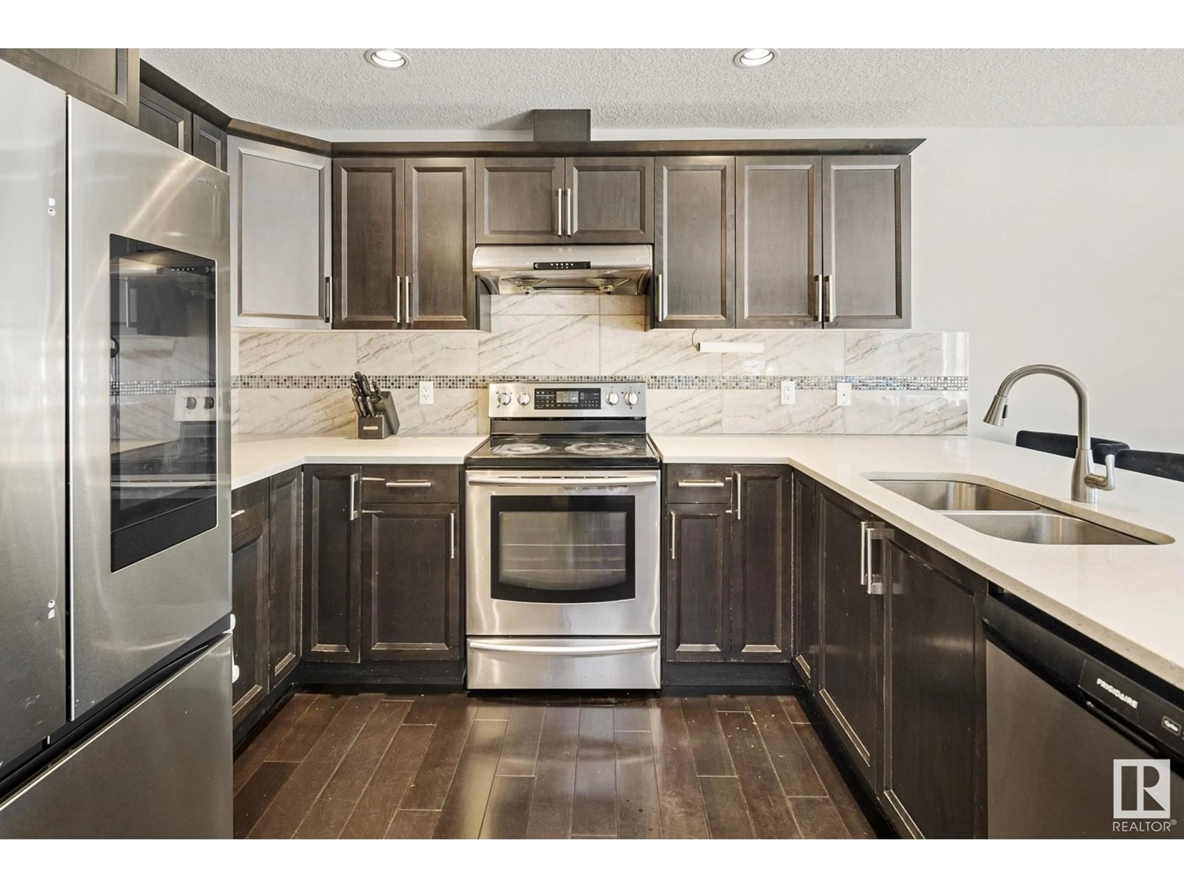 Open concept kitchen, unknown for 5951 167C AV NW, Edmonton Alberta T5Y0P4