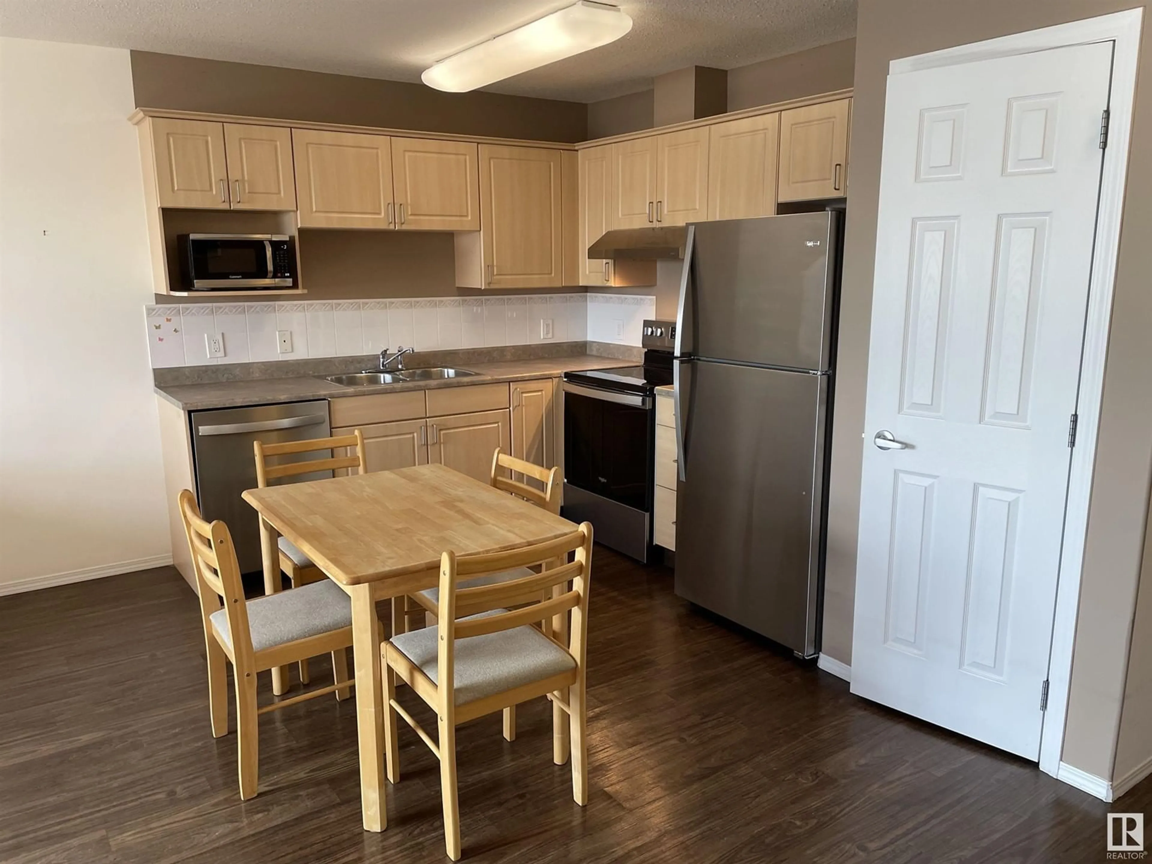 Standard kitchen, wood/laminate floor for #413 8802 SOUTHFORT DR, Fort Saskatchewan Alberta T8L4R6