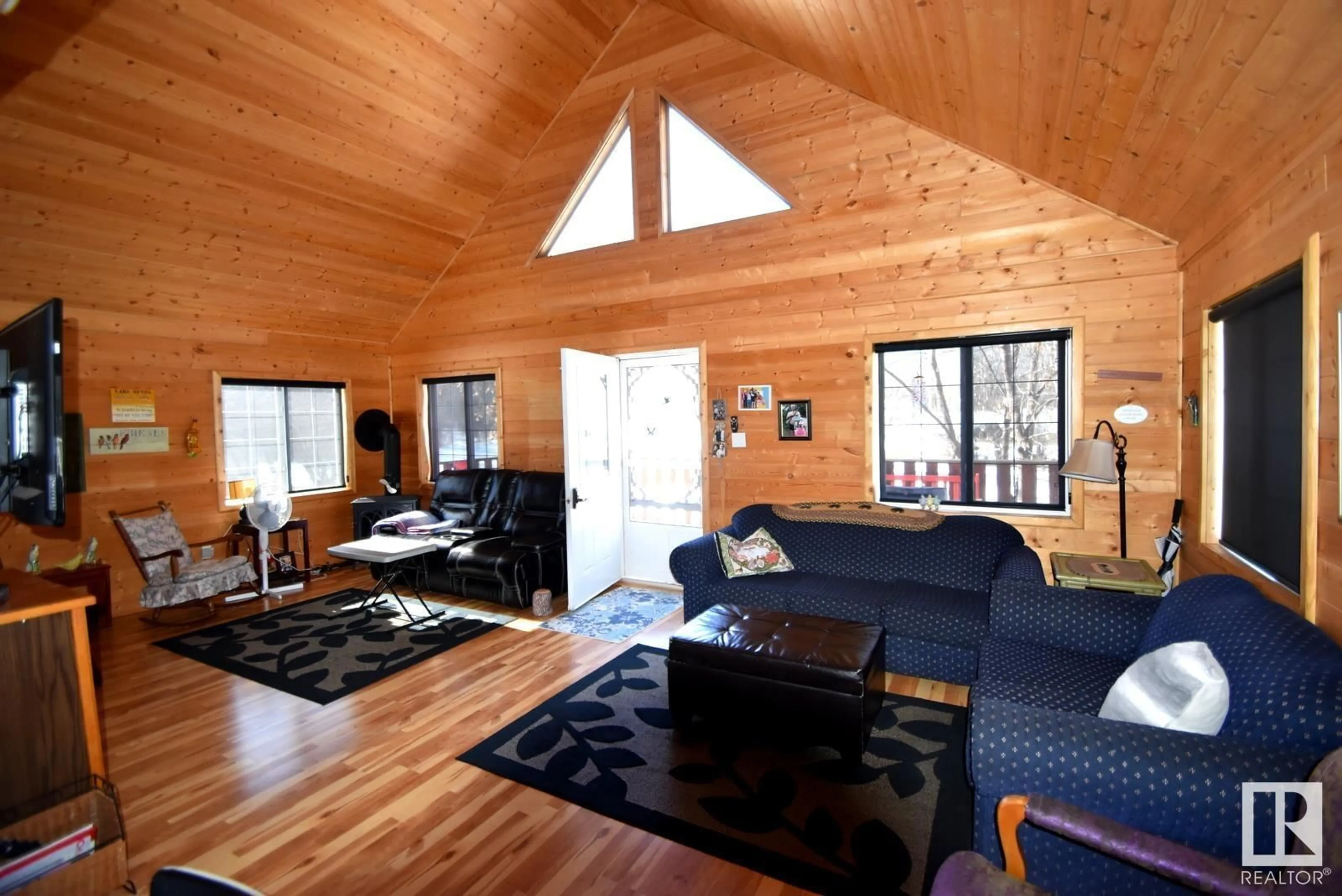 Living room with furniture, wood/laminate floor for 7 Giblak Heights North Buck Lake, Rural Athabasca County Alberta T0A0M0