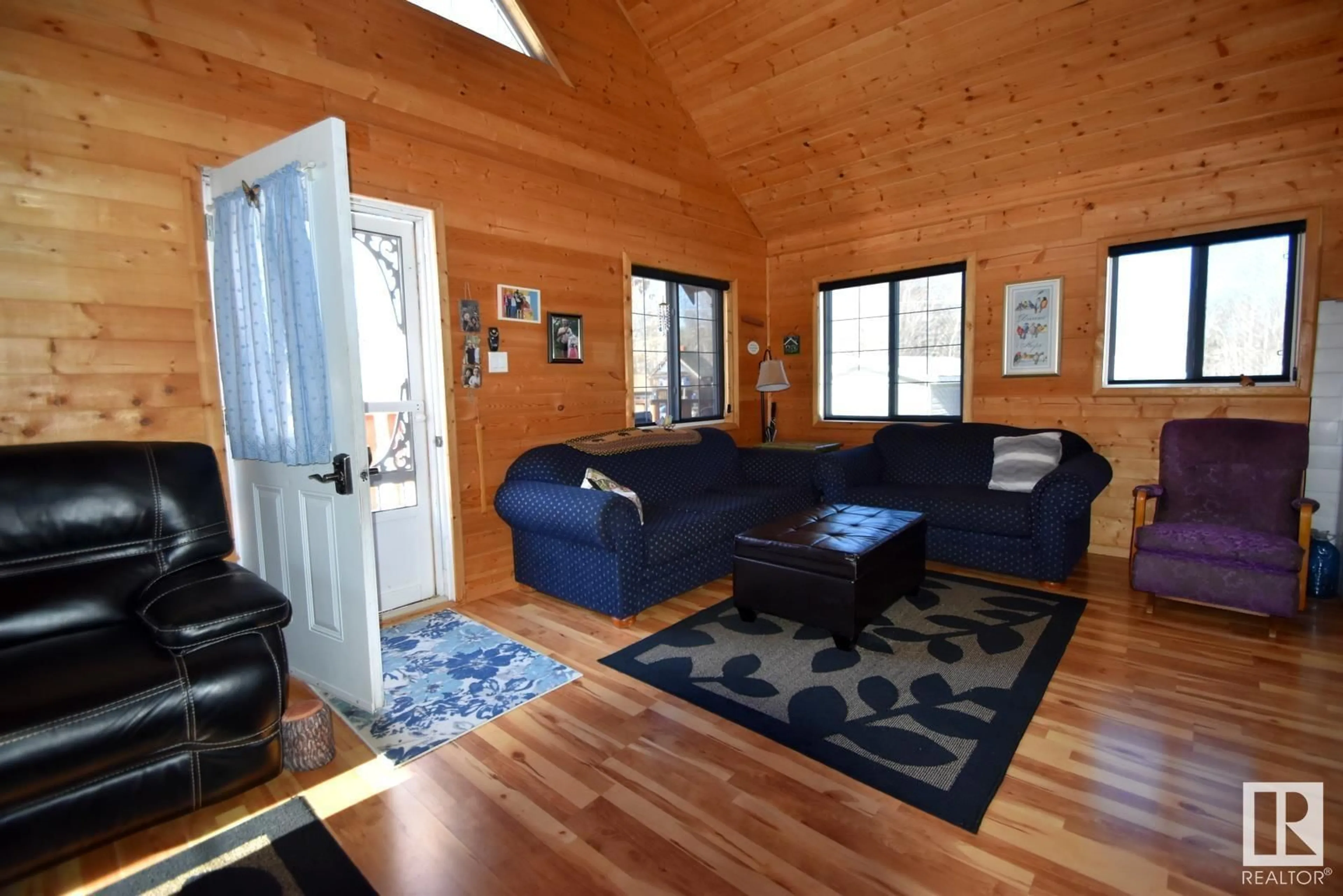 Living room with furniture, wood/laminate floor for 7 Giblak Heights North Buck Lake, Rural Athabasca County Alberta T0A0M0