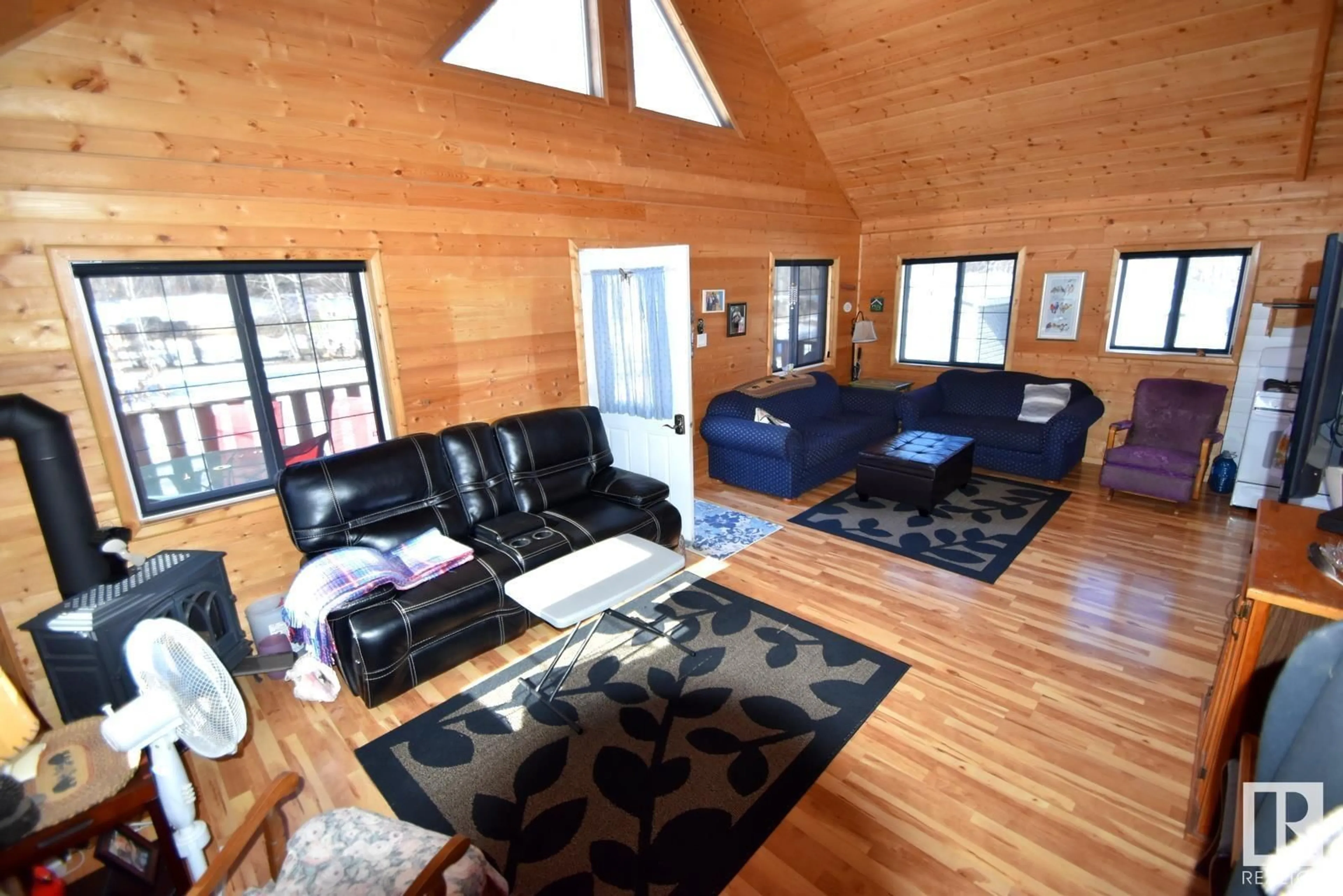 Living room with furniture, wood/laminate floor for 7 Giblak Heights North Buck Lake, Rural Athabasca County Alberta T0A0M0