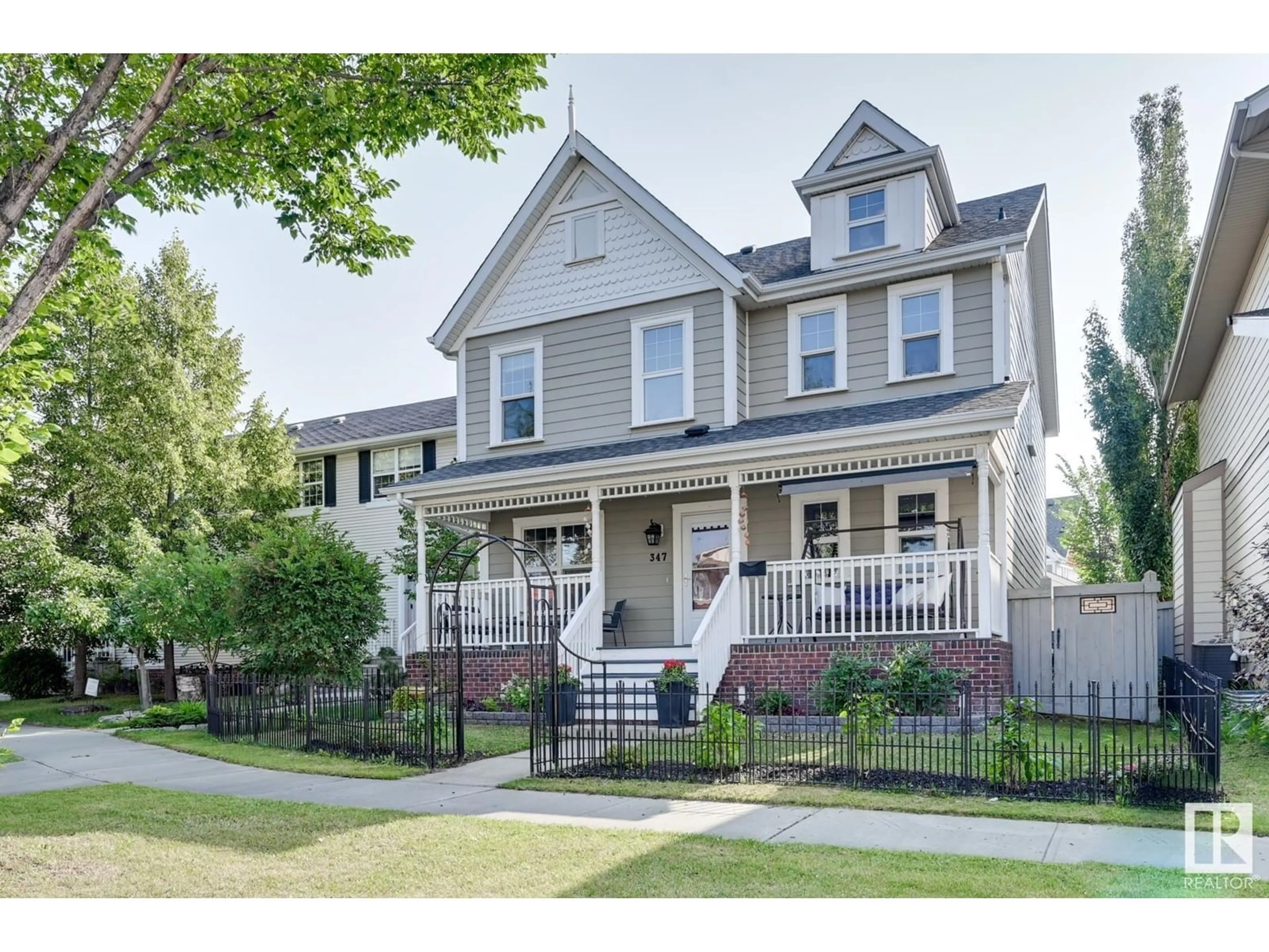 Home with vinyl exterior material, street for 347 GRIESBACH SCHOOL RD, Edmonton Alberta T5E6N1