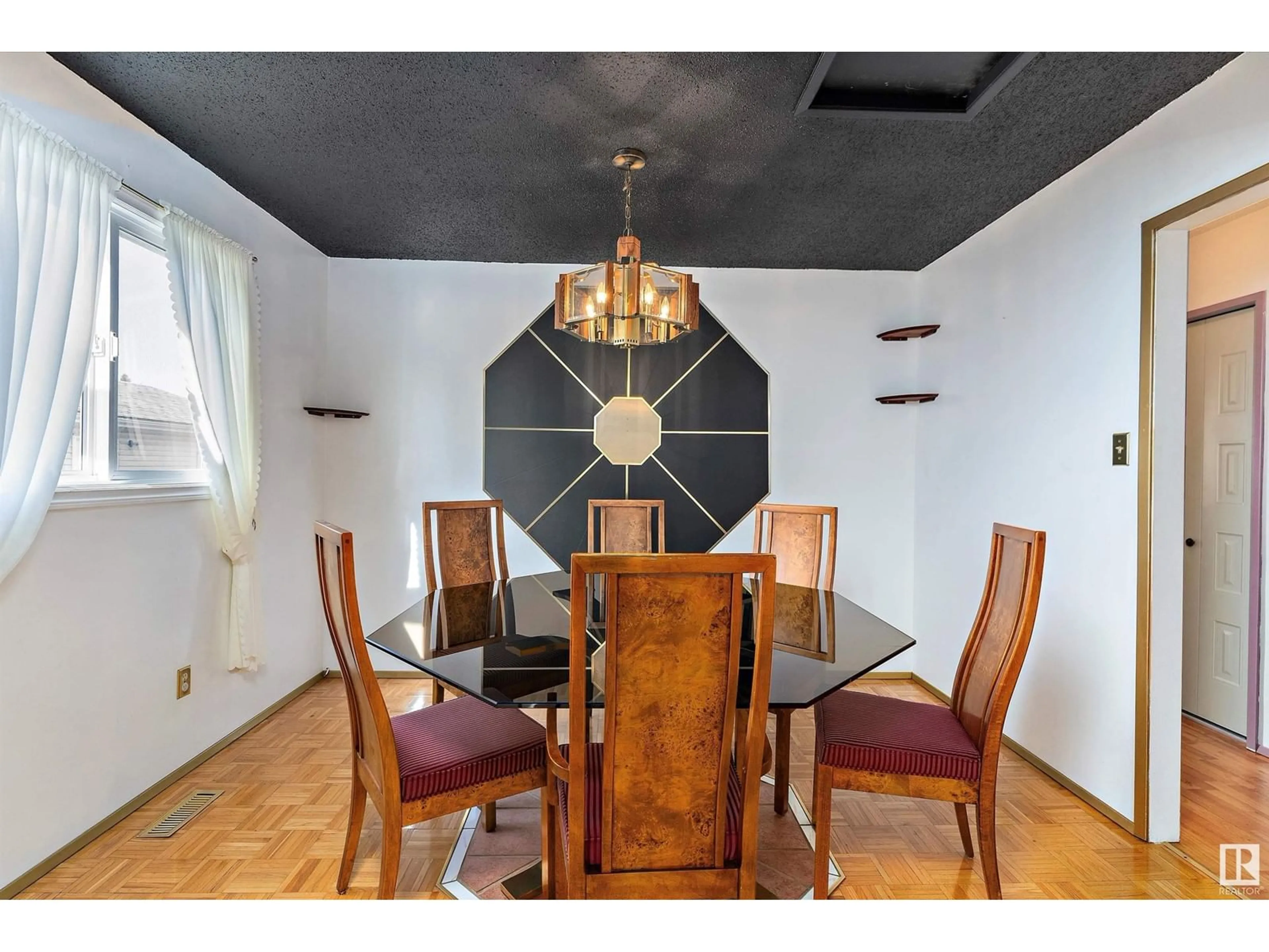 Dining room, wood/laminate floor for 10314 158 AV NW, Edmonton Alberta T5X4H4