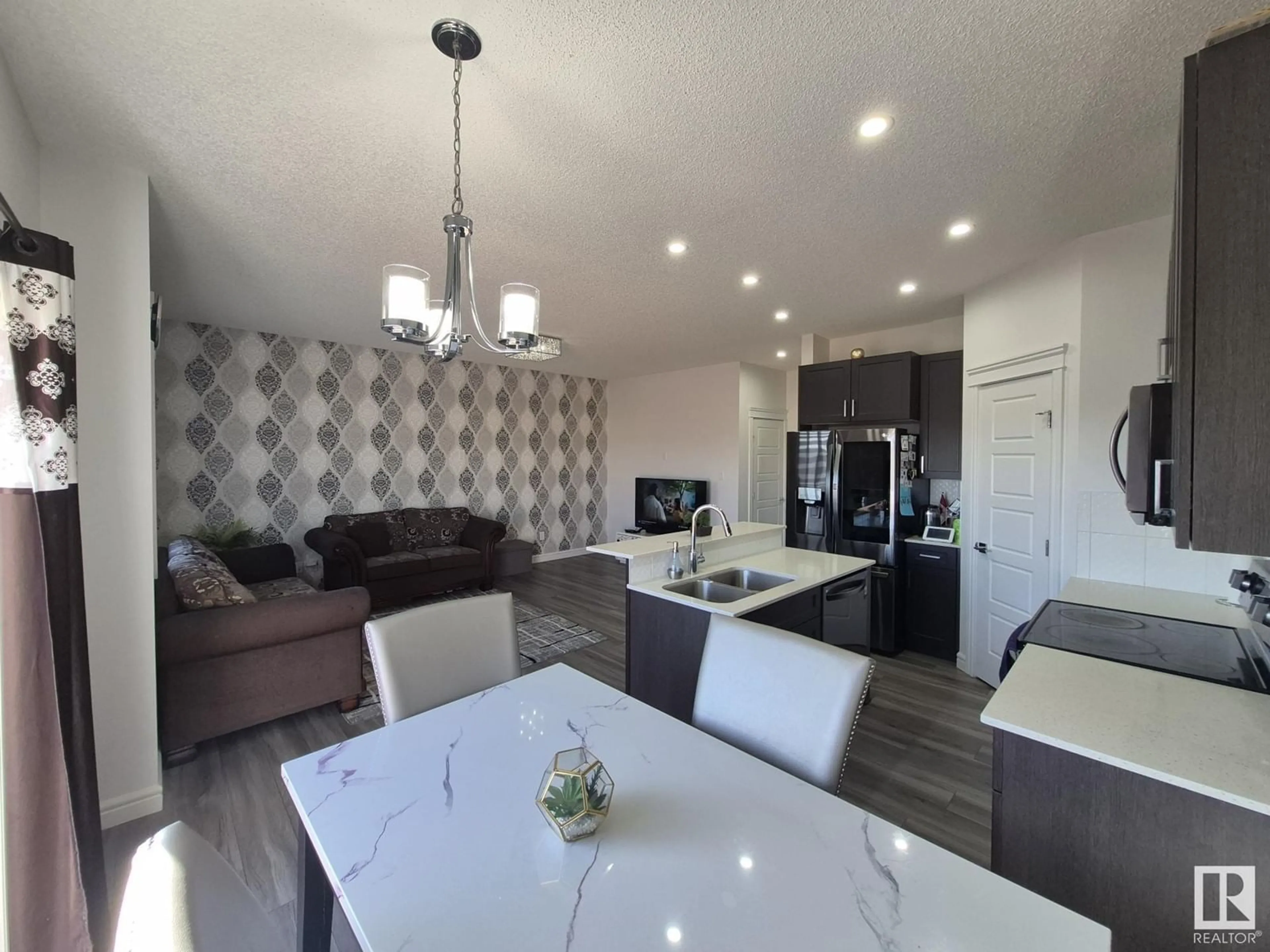 Open concept kitchen, unknown for 2523 12 AV NW, Edmonton Alberta T6T2M6