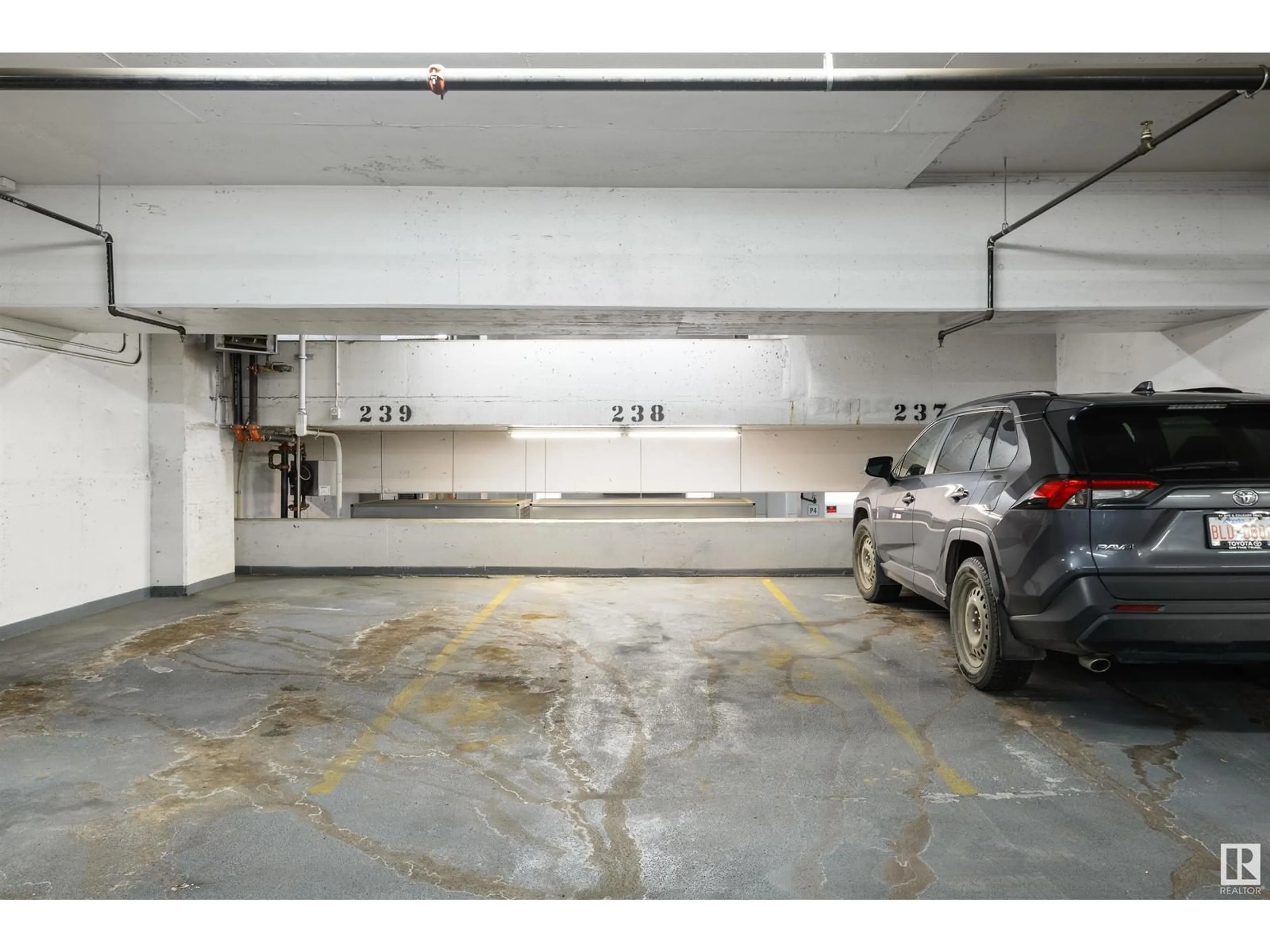 Indoor garage for 10238 103 ST NW, Edmonton Alberta T5J0G6