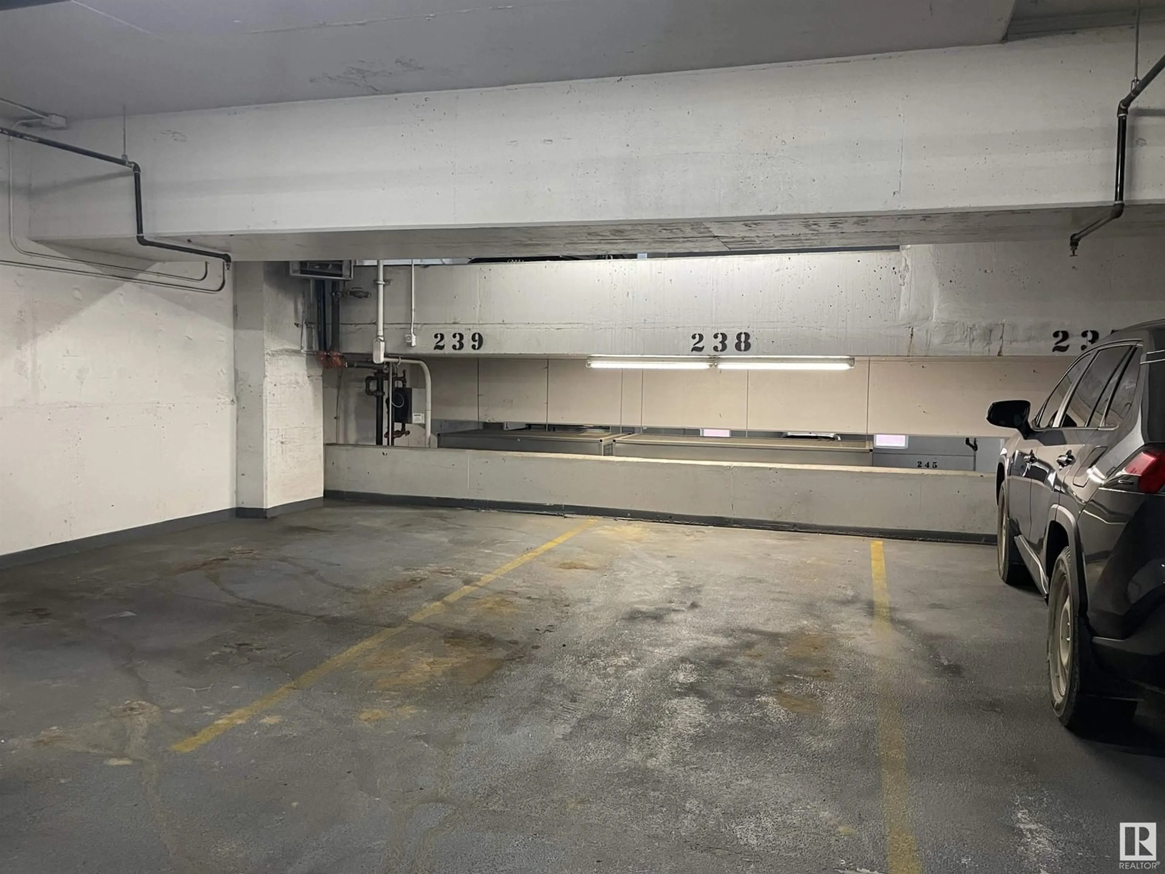 Indoor garage for 10238 103 ST NW, Edmonton Alberta T5J0G6