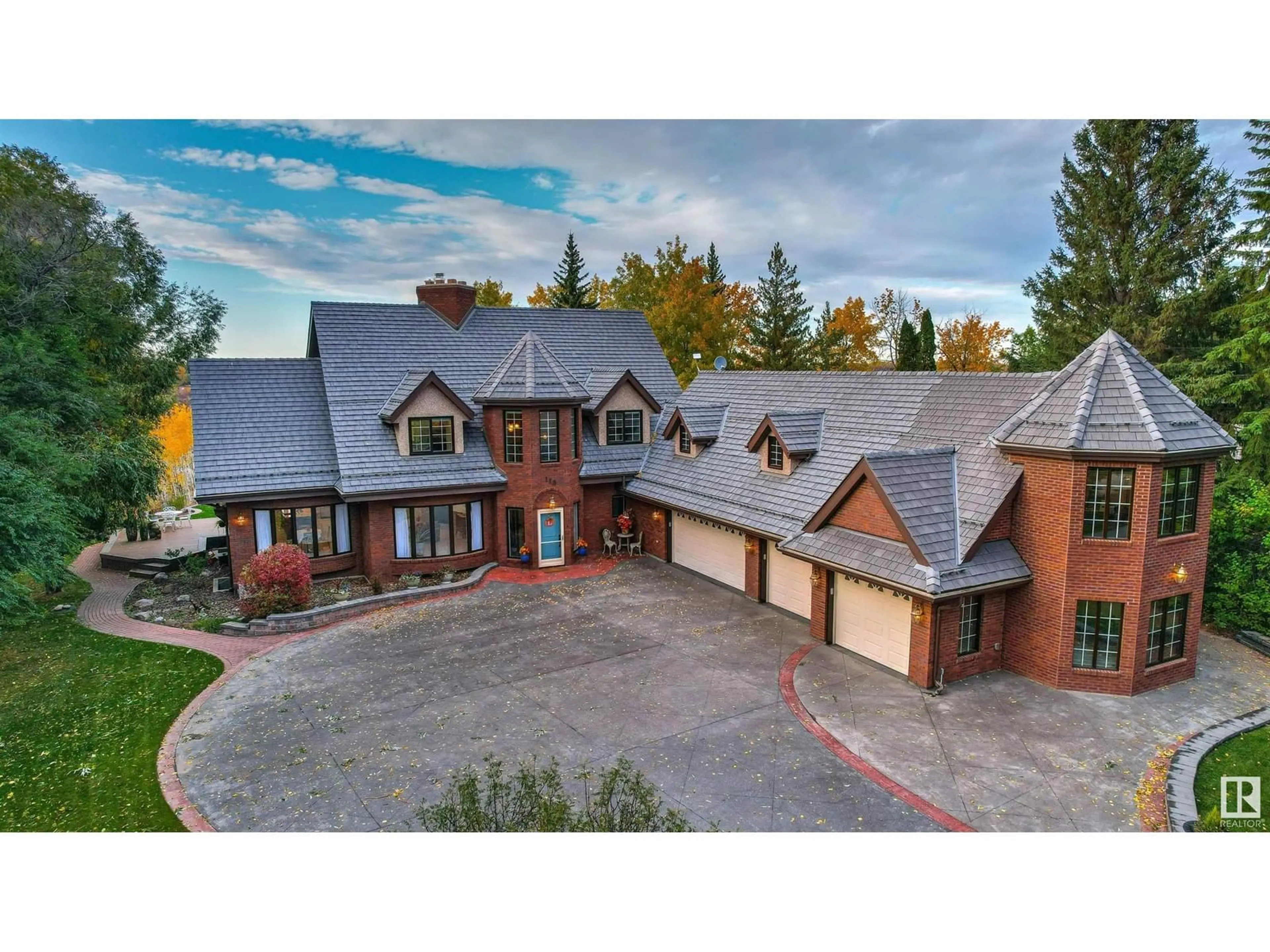 A pic from outside/outdoor area/front of a property/back of a property/a pic from drone, mountain view for 116 Windermere DR NW, Edmonton Alberta T6W0S5