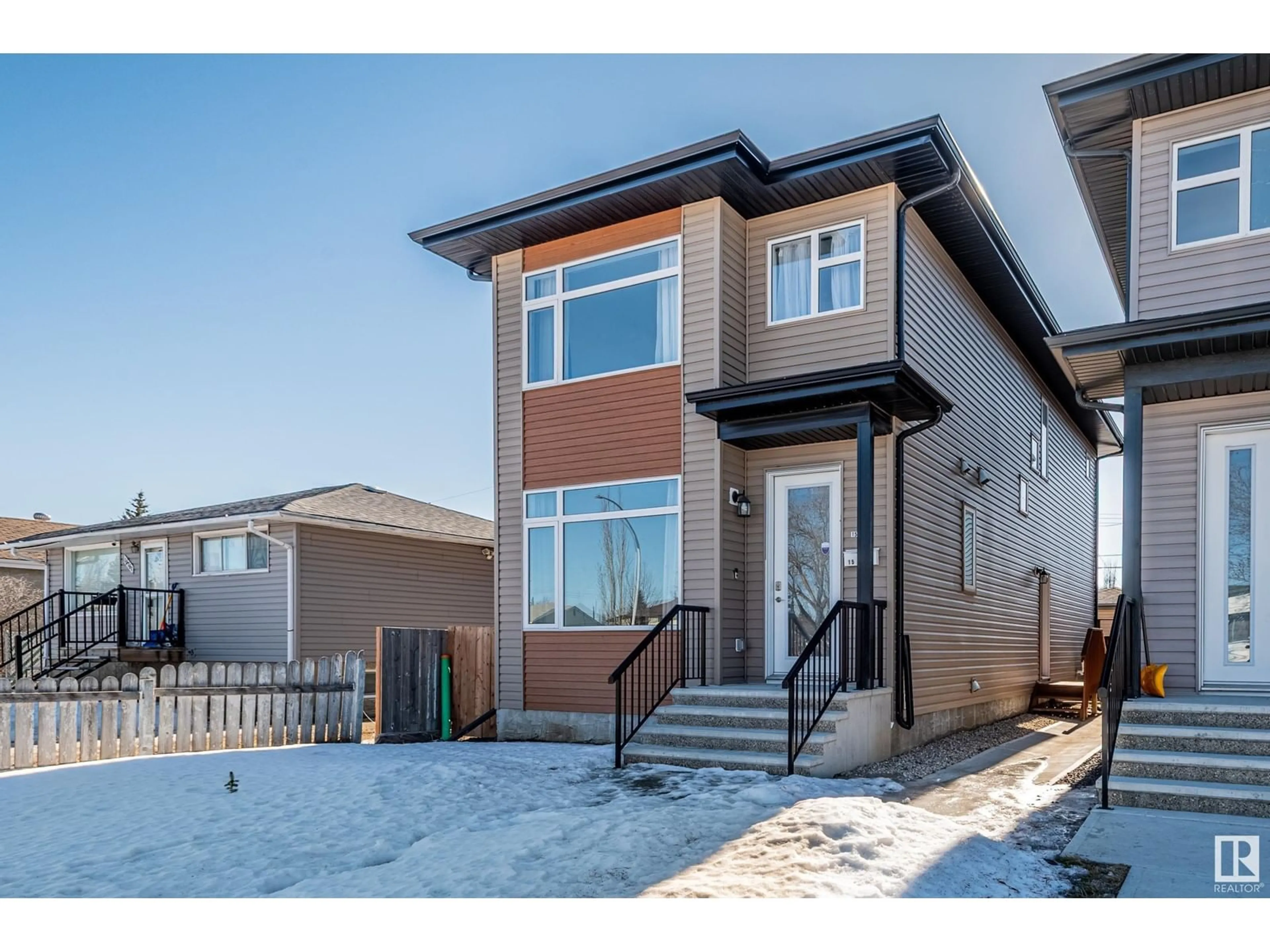 Home with vinyl exterior material, street for 15765 106A AV NW, Edmonton Alberta T5P0X2