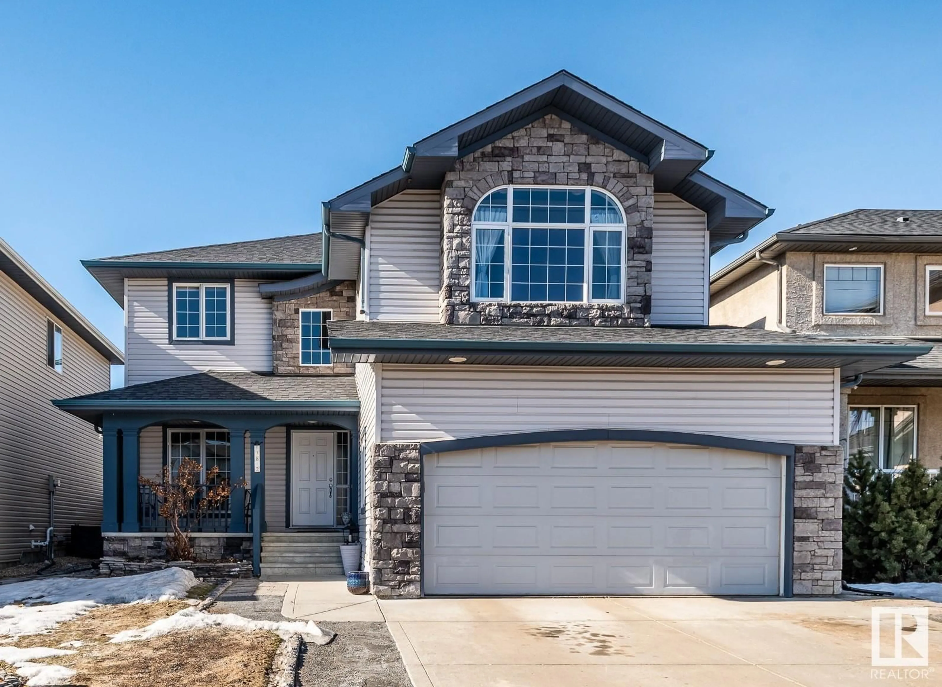 Home with vinyl exterior material, street for 17812 110 ST NW, Edmonton Alberta T6X6K5