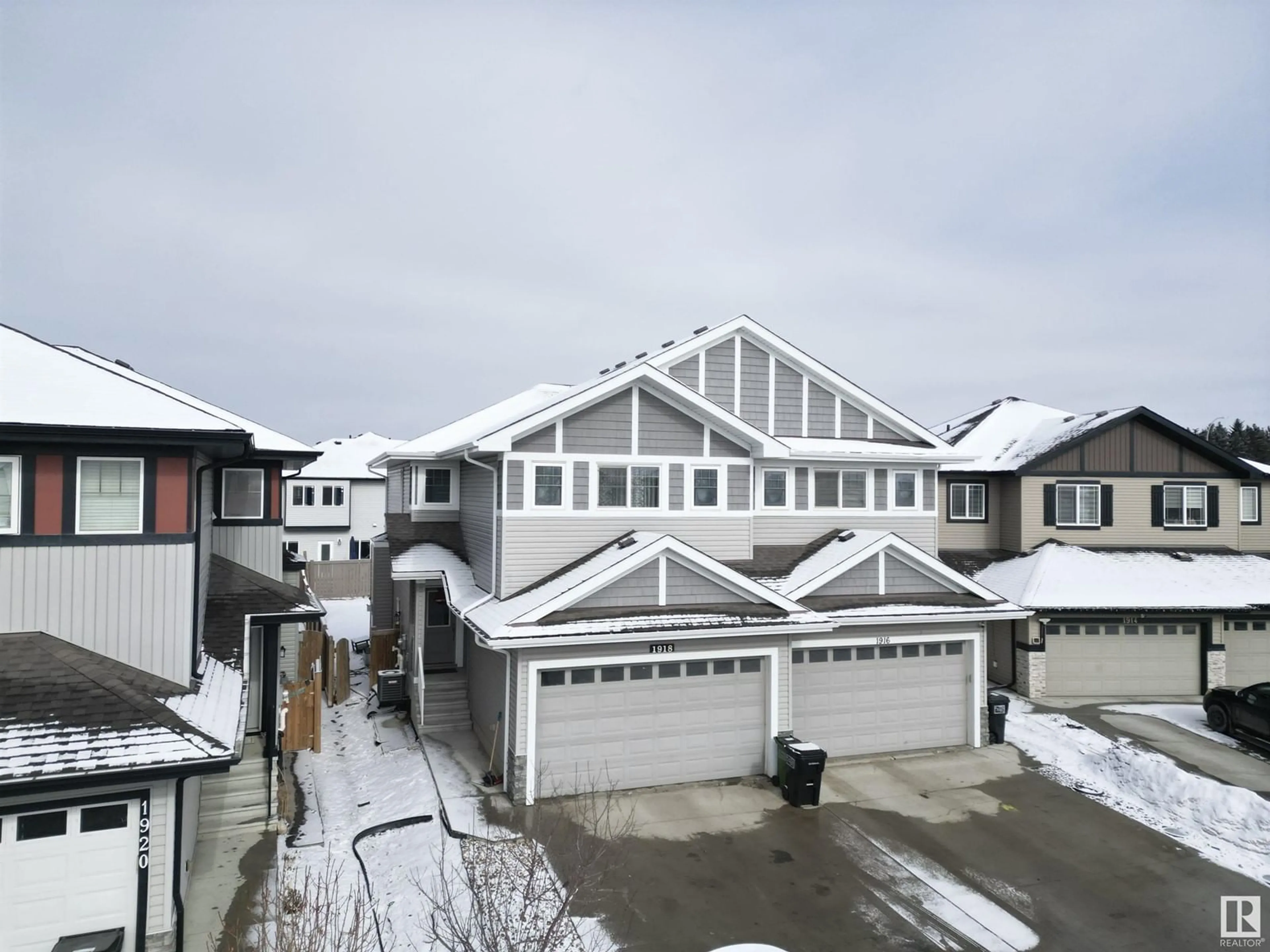 A pic from outside/outdoor area/front of a property/back of a property/a pic from drone, street for 1918 15 AV NW, Edmonton Alberta T6T2B6