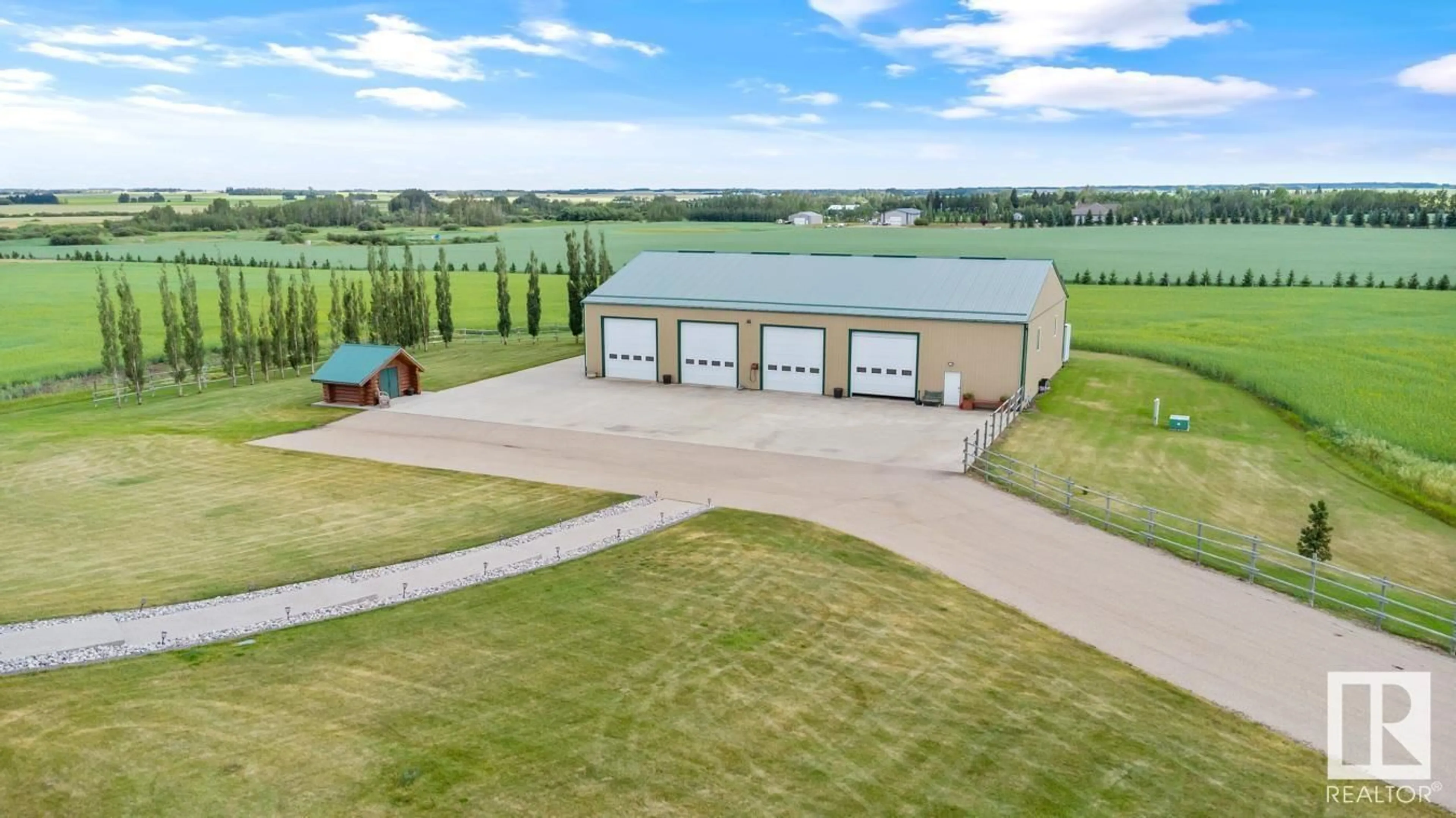 A pic from outside/outdoor area/front of a property/back of a property/a pic from drone, building for 49169 RR 260, Rural Leduc County Alberta T9E2X1