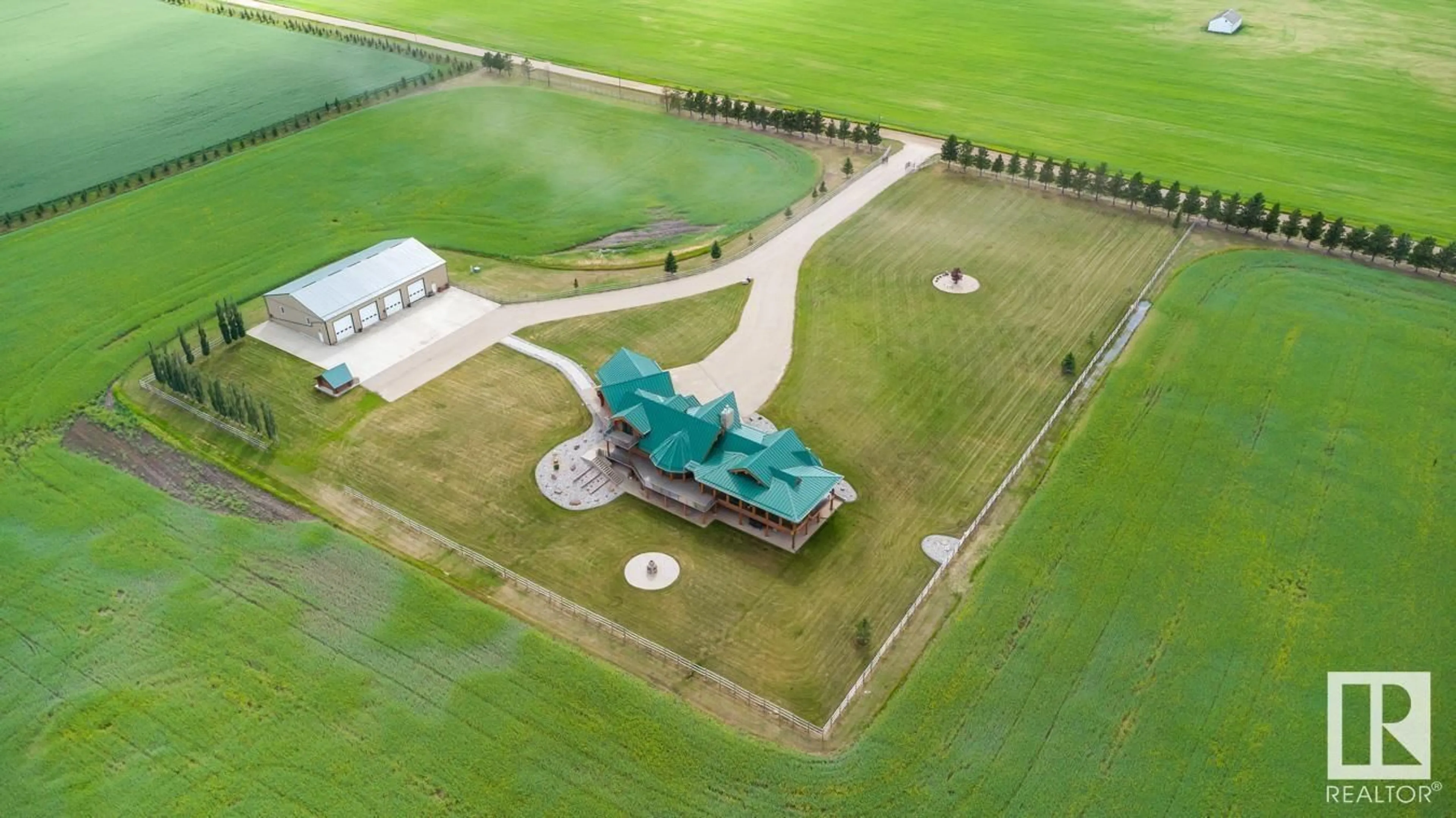 A pic from outside/outdoor area/front of a property/back of a property/a pic from drone, building for 49169 RR 260, Rural Leduc County Alberta T9E2X1