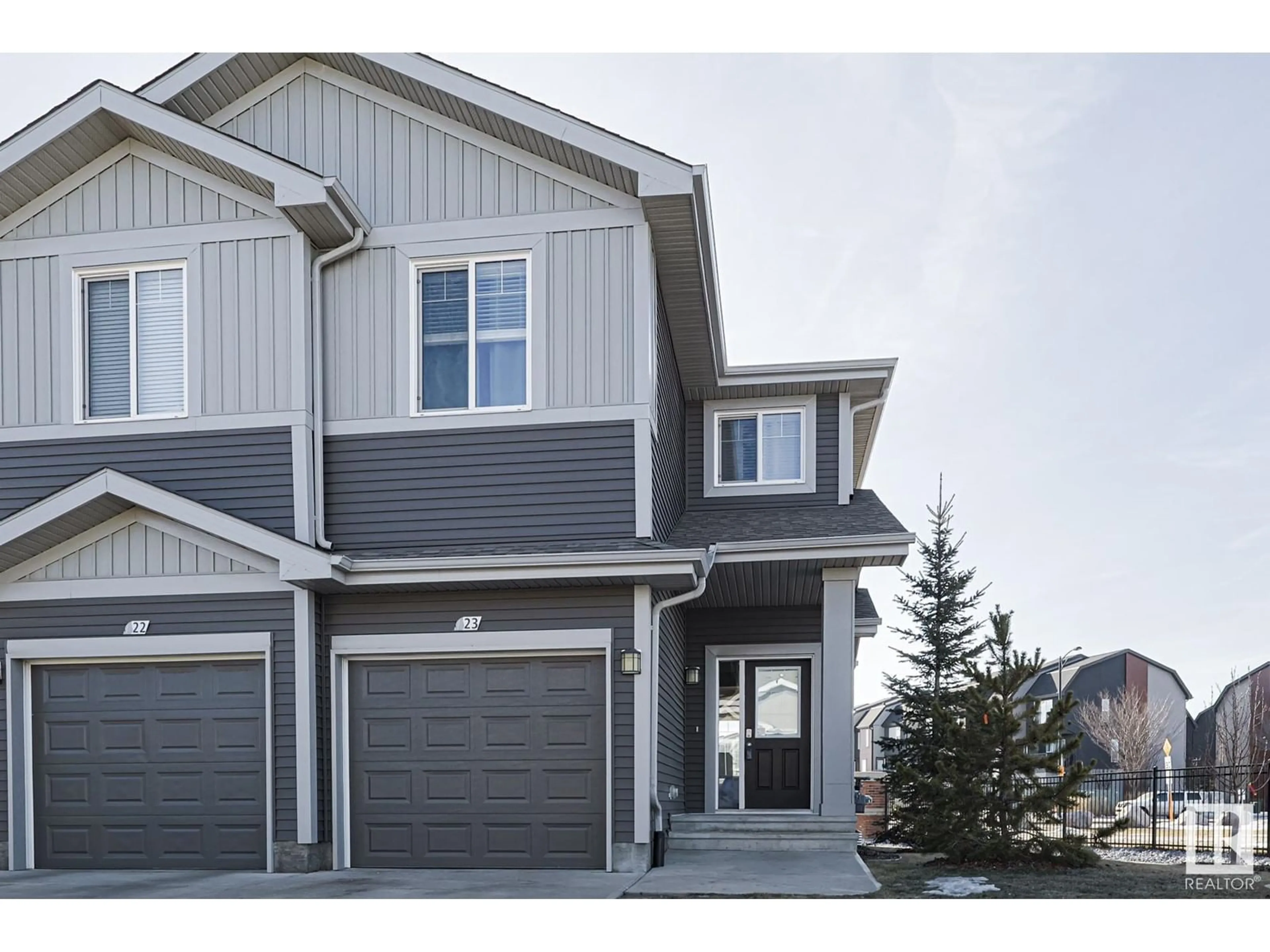 Home with vinyl exterior material, street for #23 6004 ROSENTHAL WY NW NW, Edmonton Alberta T5T7L1