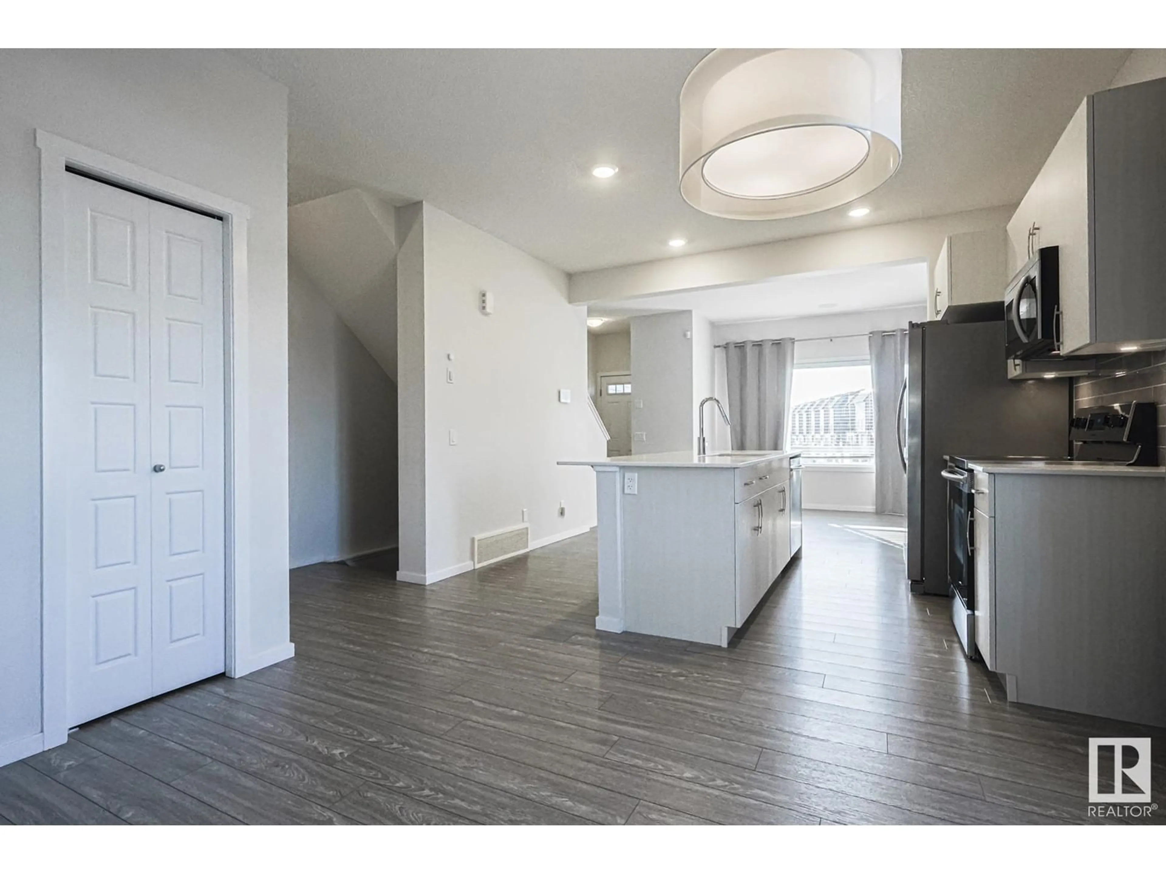 Open concept kitchen, unknown for #23 6004 ROSENTHAL WY NW NW, Edmonton Alberta T5T7L1