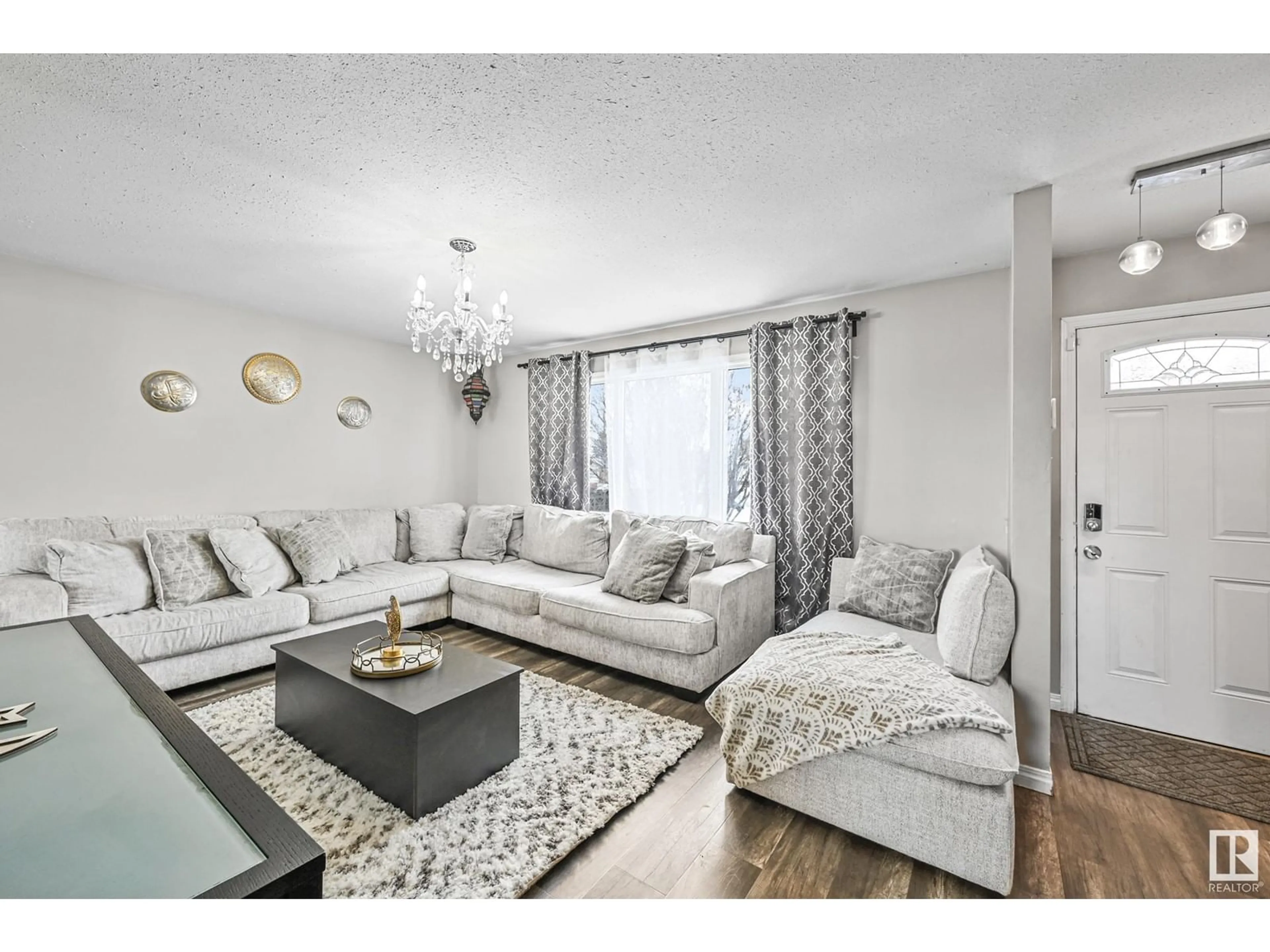 Living room with furniture, unknown for 7303 132 AV NW, Edmonton Alberta T5C3C6