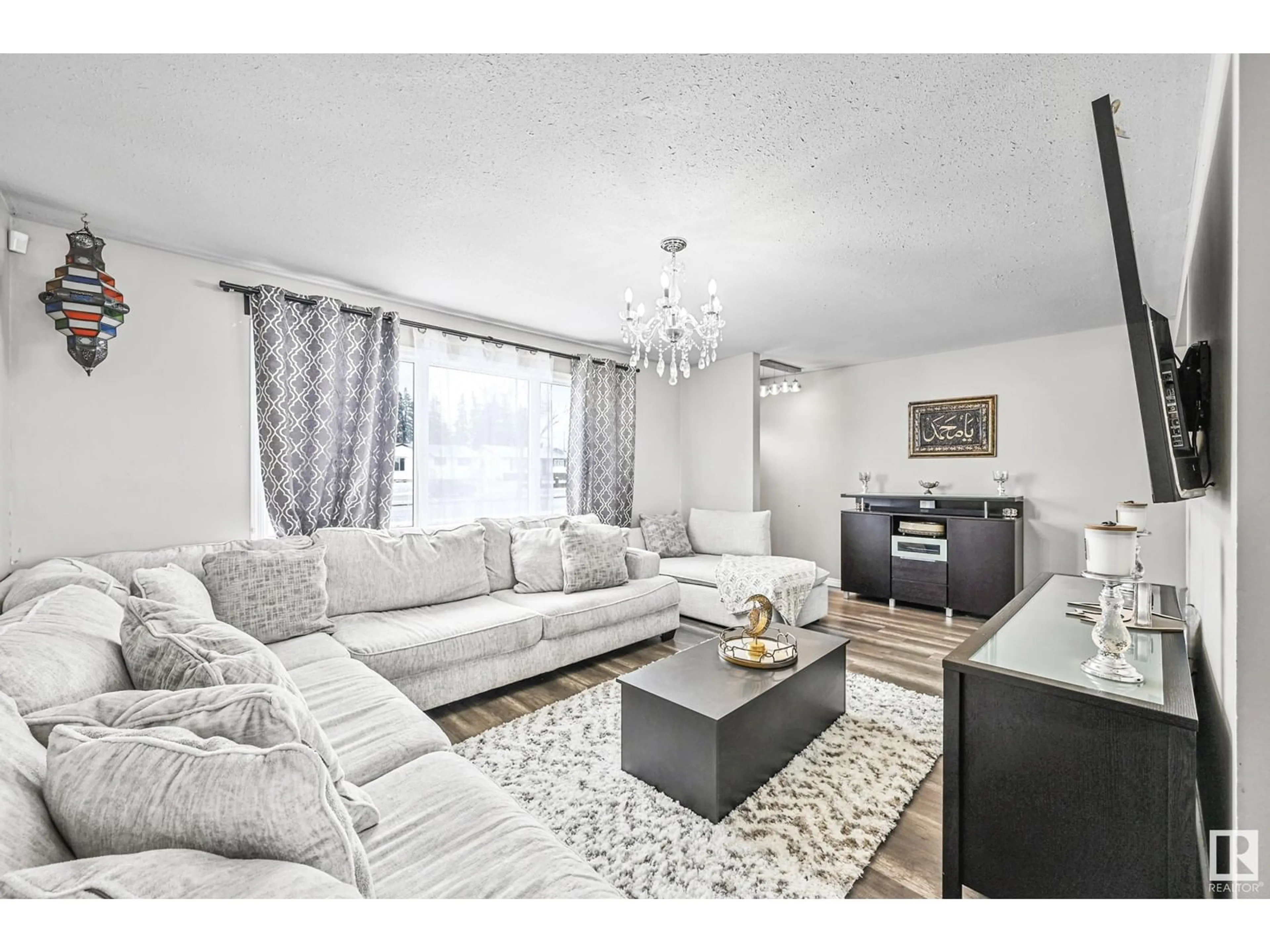 Living room with furniture, unknown for 7303 132 AV NW, Edmonton Alberta T5C3C6