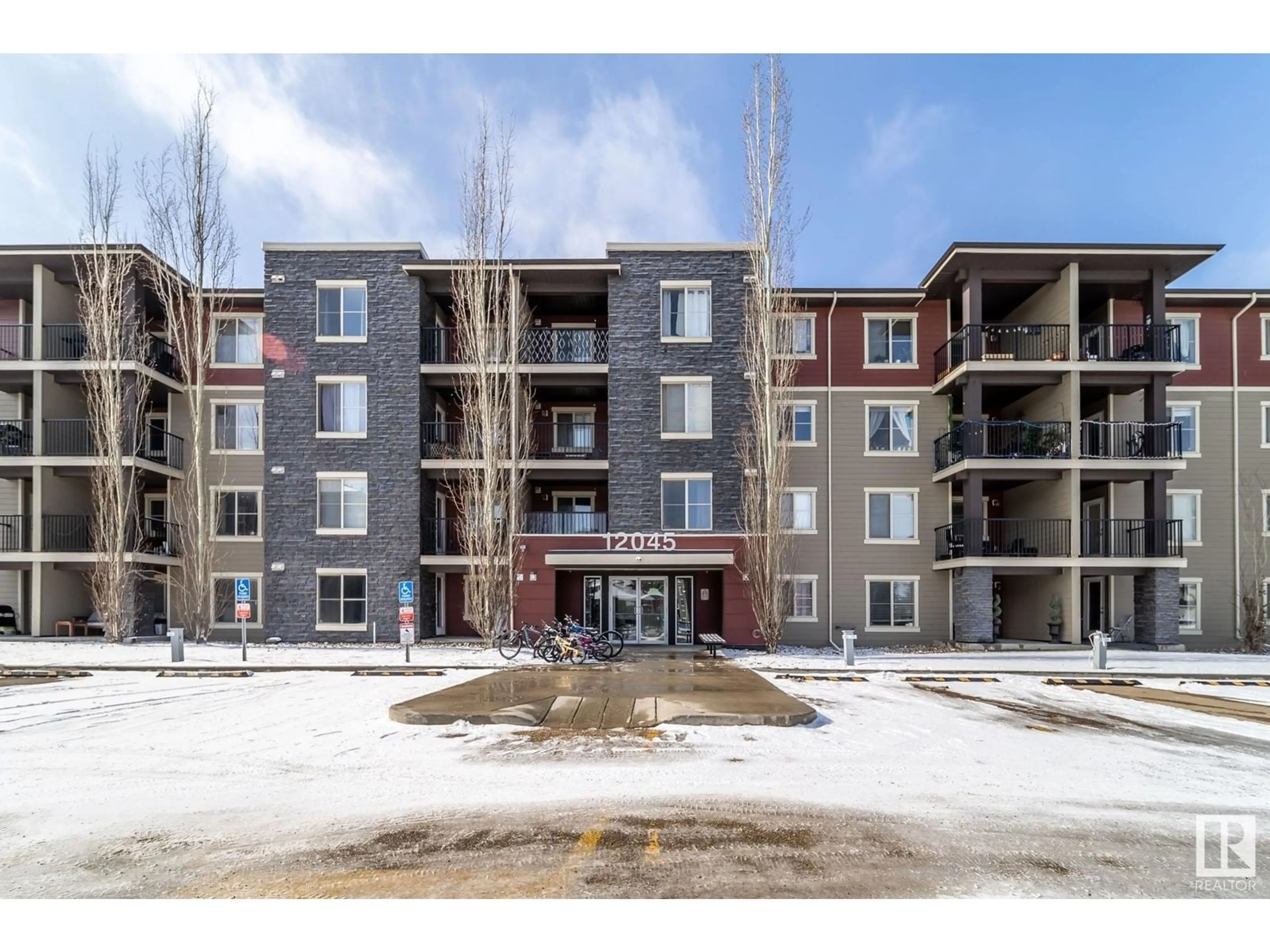 A pic from outside/outdoor area/front of a property/back of a property/a pic from drone, building for #402 12045 22 AV SW SW, Edmonton Alberta T6W2Y2