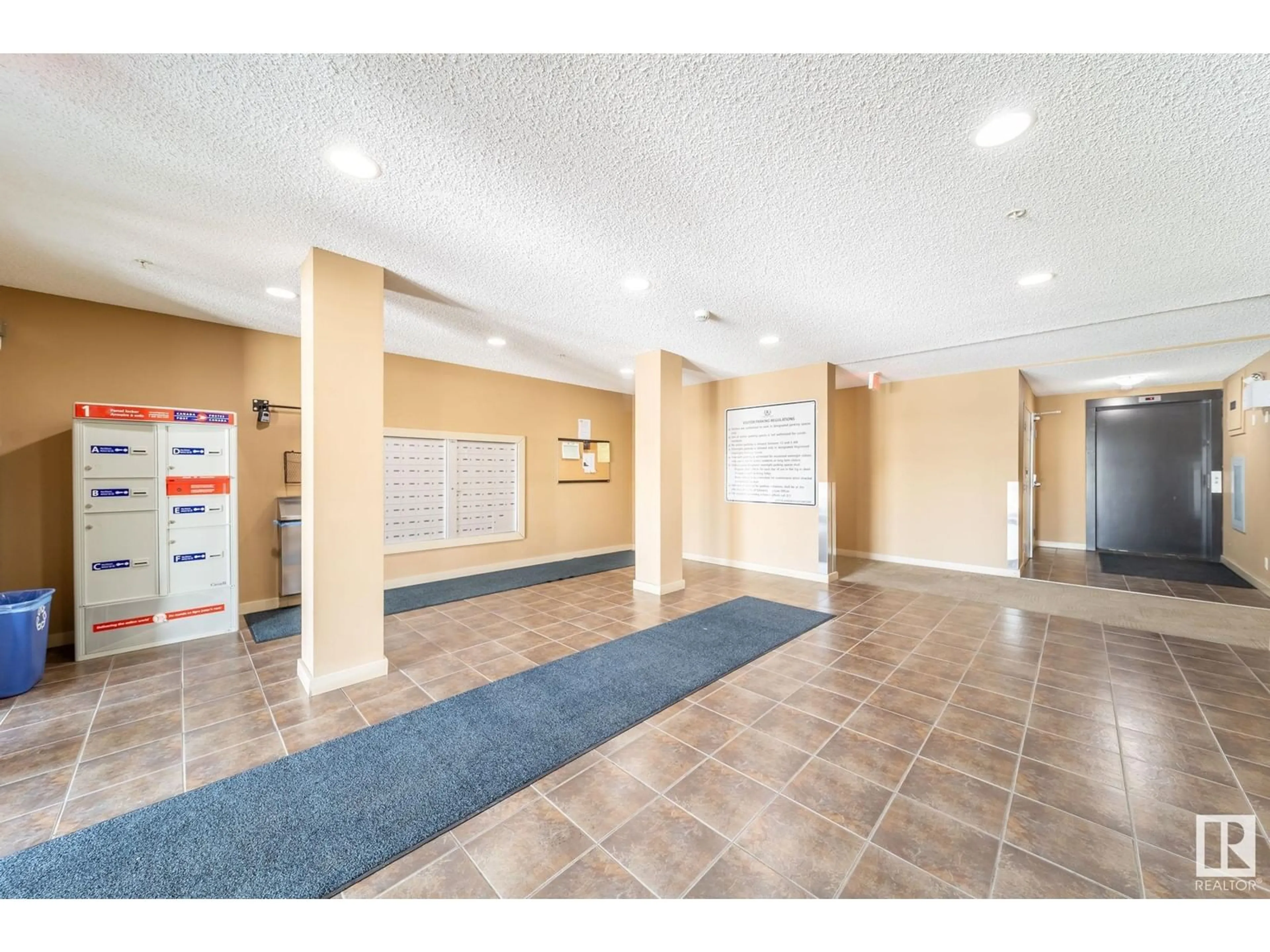 Indoor foyer for #402 12045 22 AV SW SW, Edmonton Alberta T6W2Y2