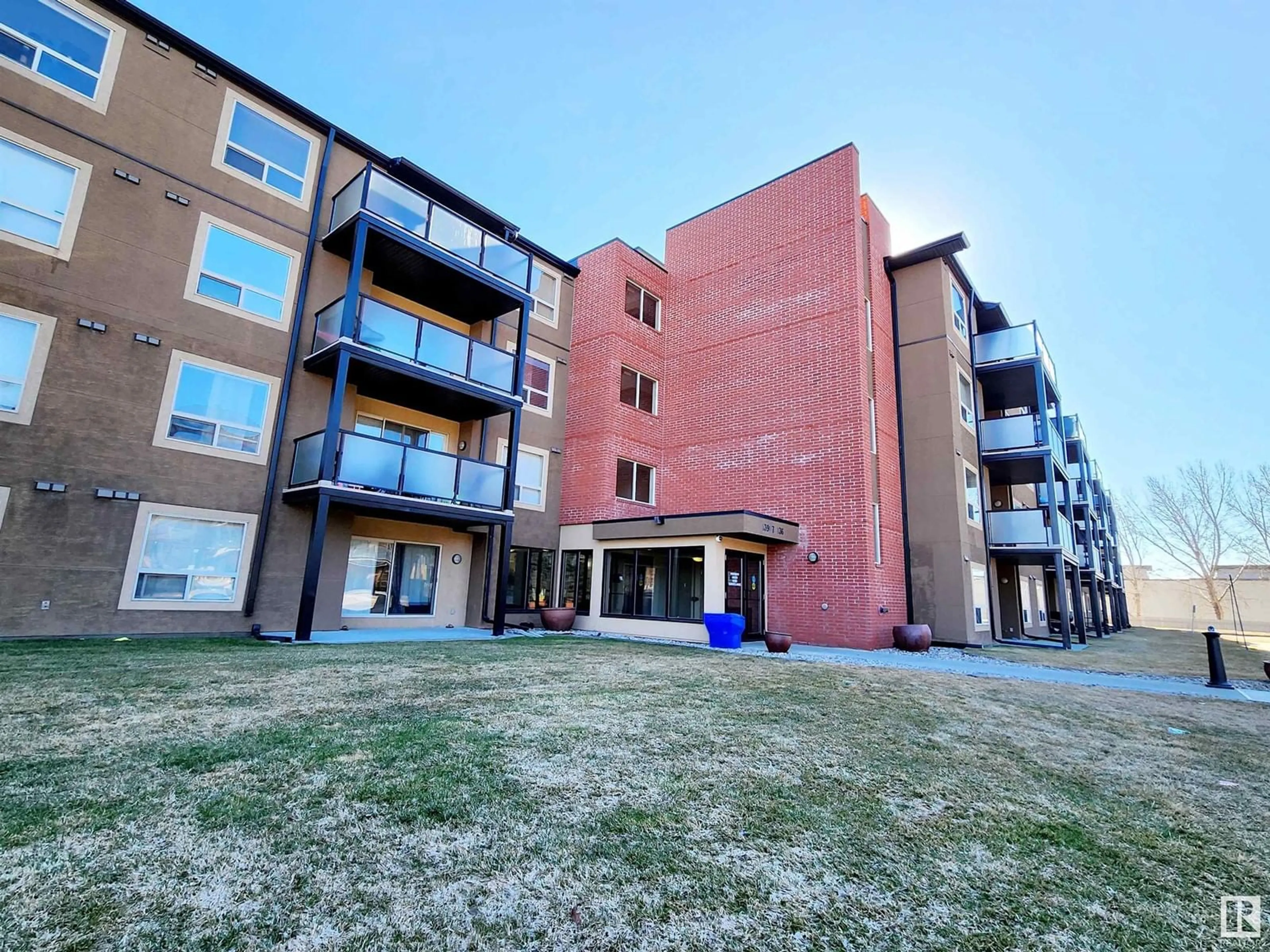 A pic from outside/outdoor area/front of a property/back of a property/a pic from drone, building for #412 13907 136 ST NW, Edmonton Alberta T6V1Y5