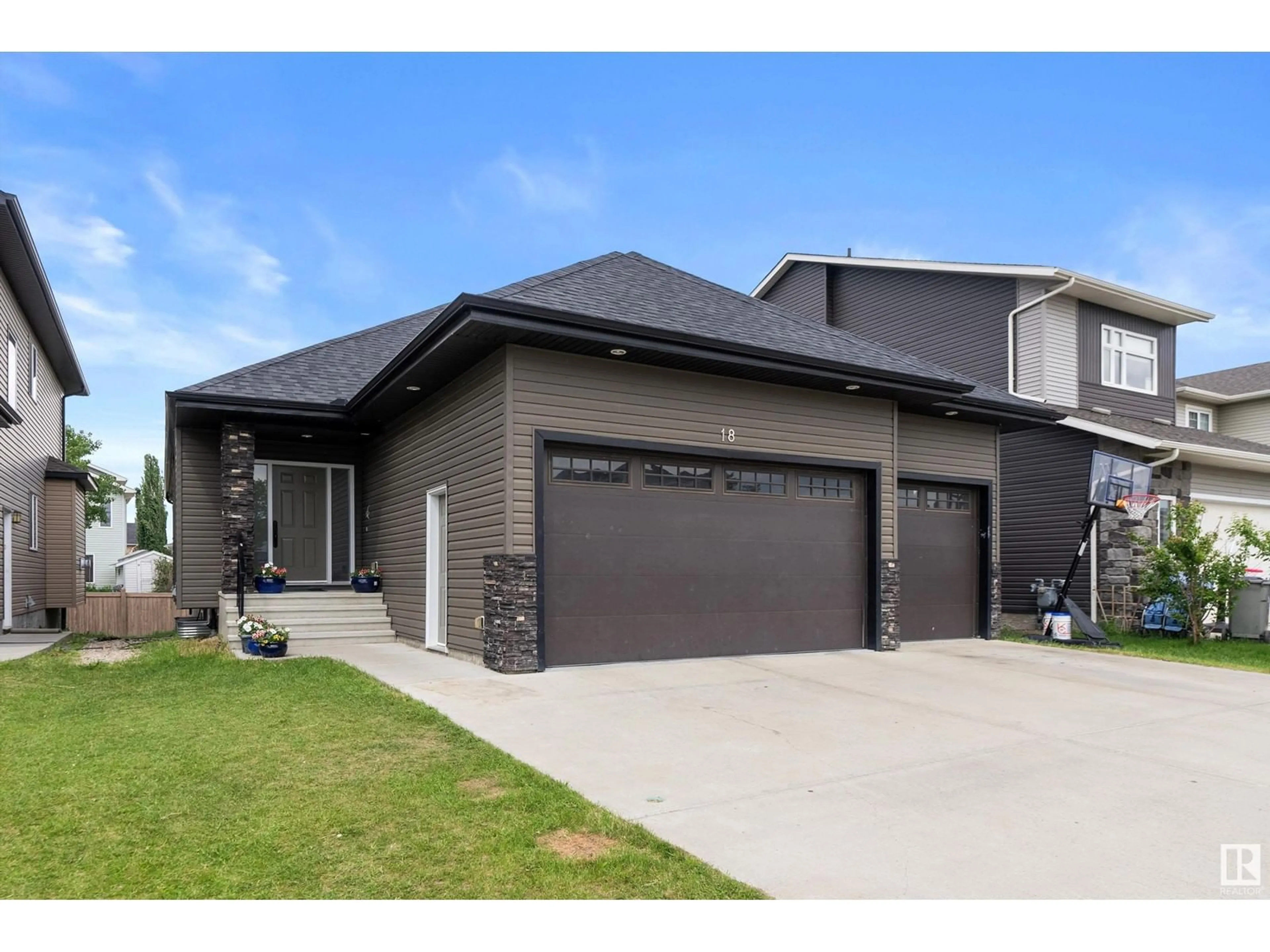 Home with brick exterior material, street for 18 LAKEVISTA PT, Beaumont Alberta T4X0J2