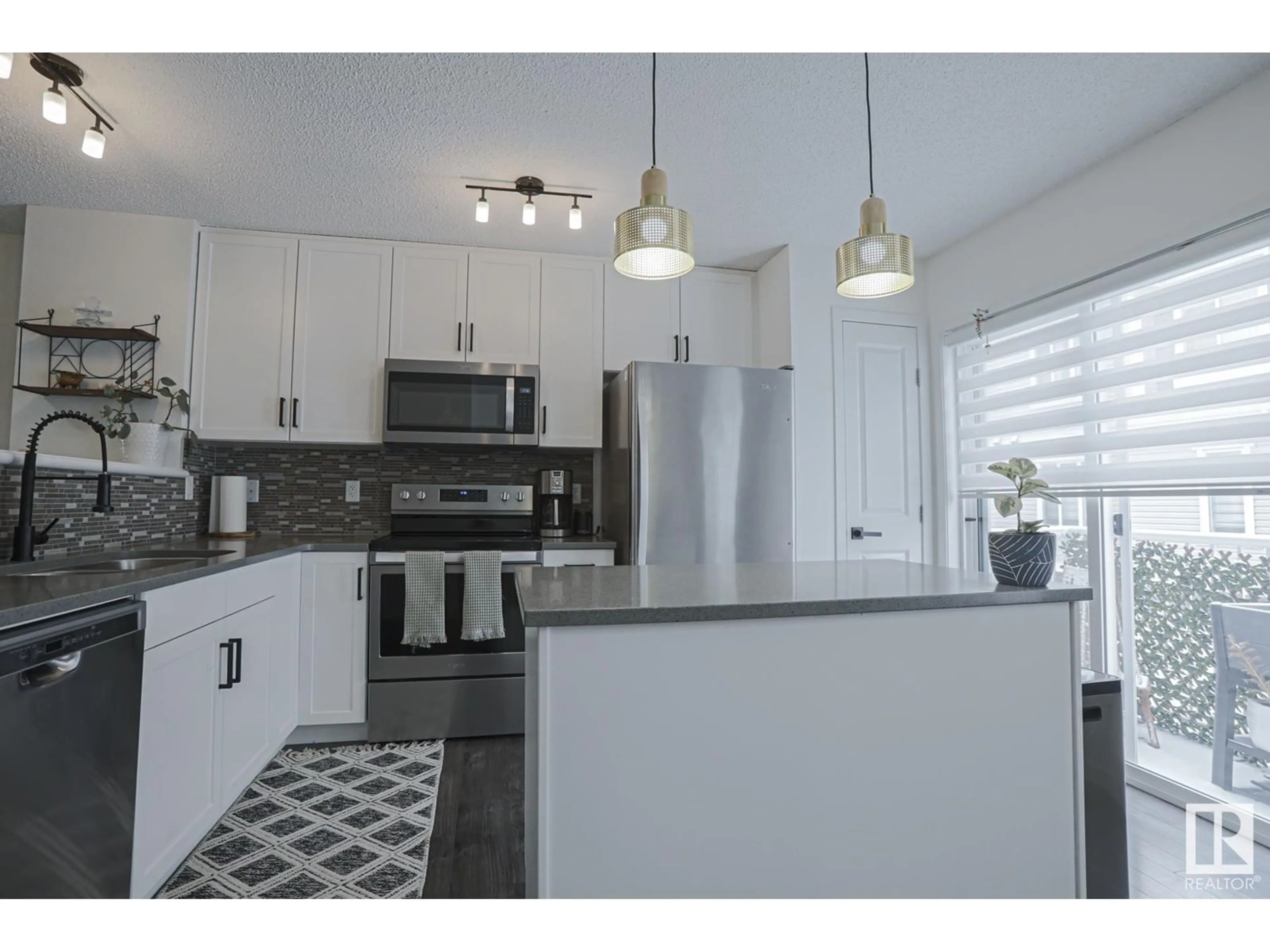 Open concept kitchen, unknown for #156 2905 141 ST SW, Edmonton Alberta T6W3M4