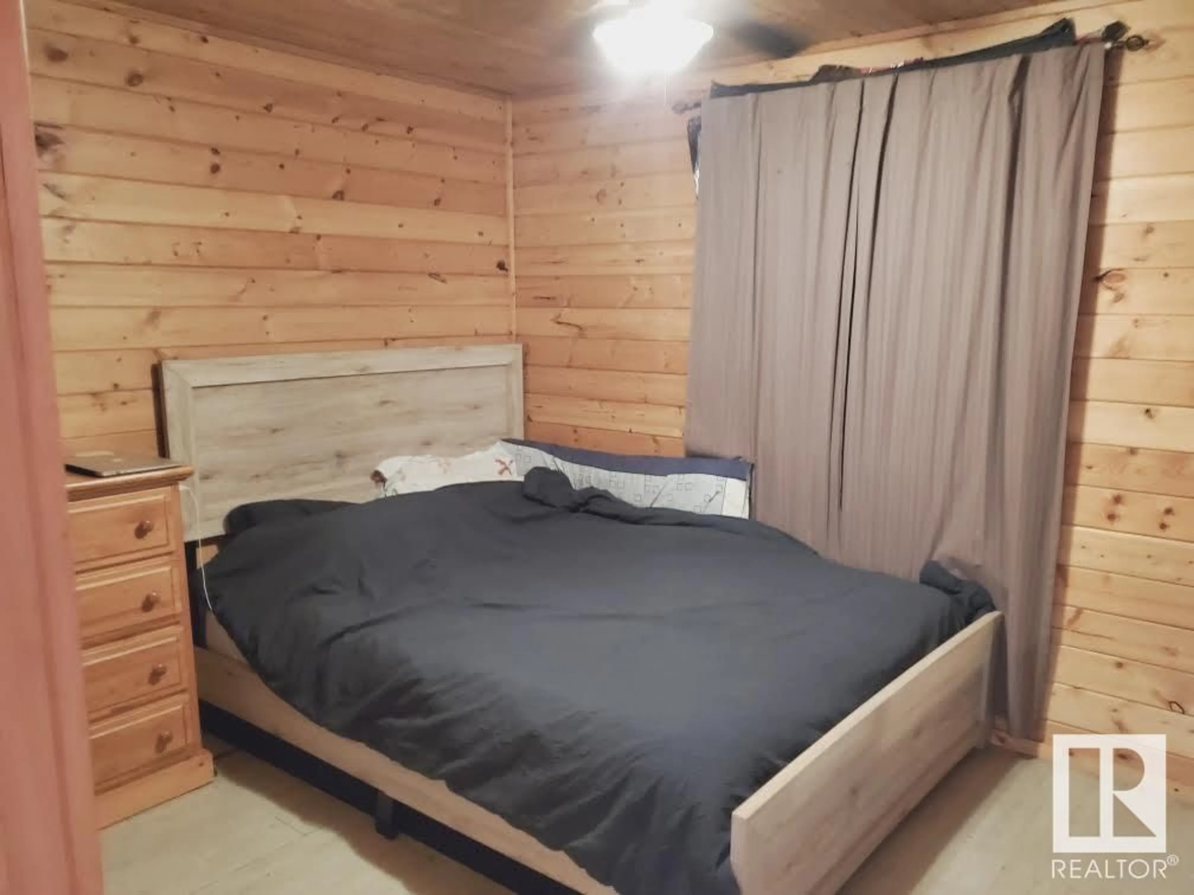 Bedroom with bed, wood/laminate floor for 603 10 ST, Cold Lake Alberta T9M1A9