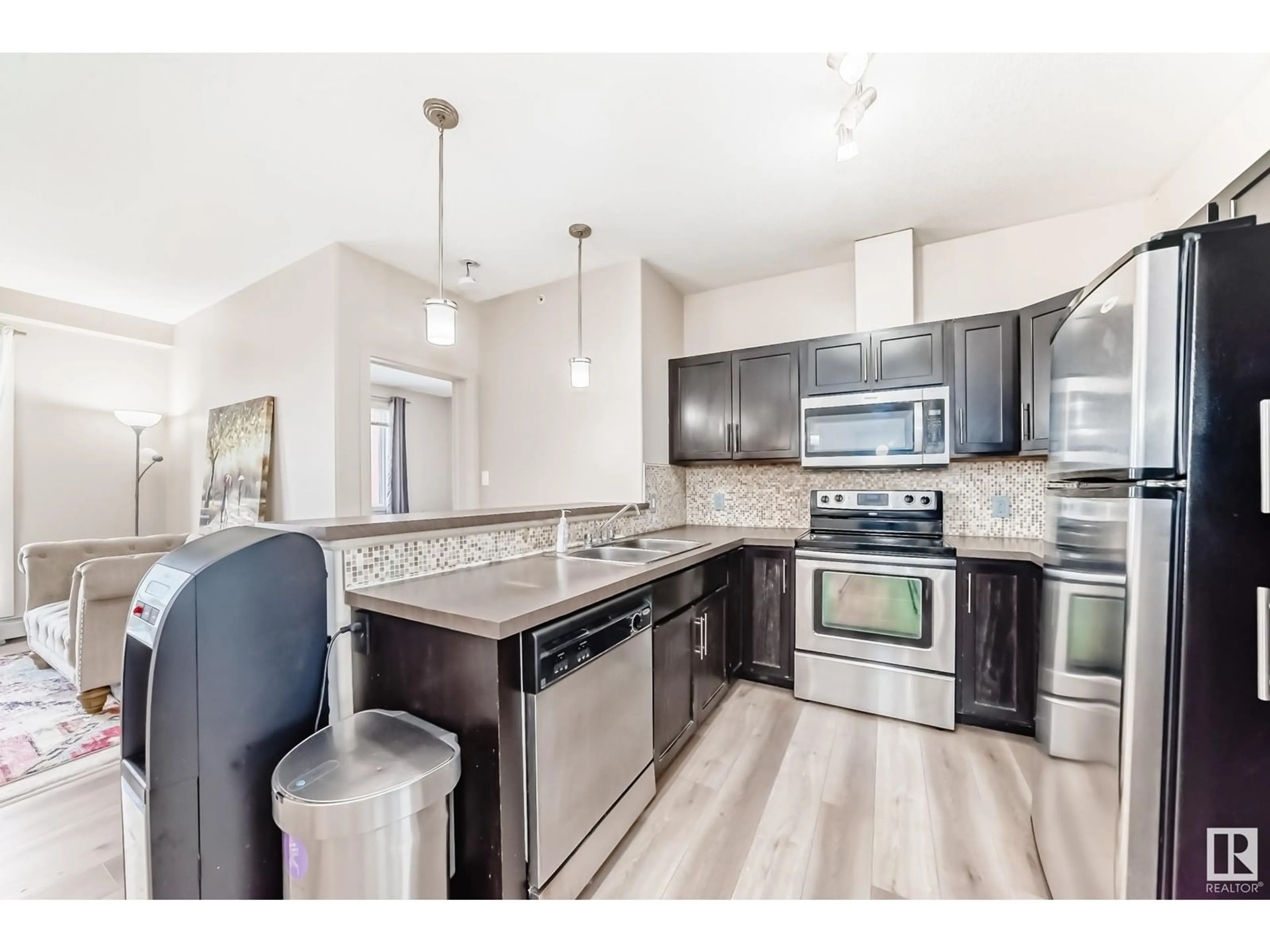 Open concept kitchen, unknown for #416 304 AMBLESIDE LI SW, Edmonton Alberta T6W0V2