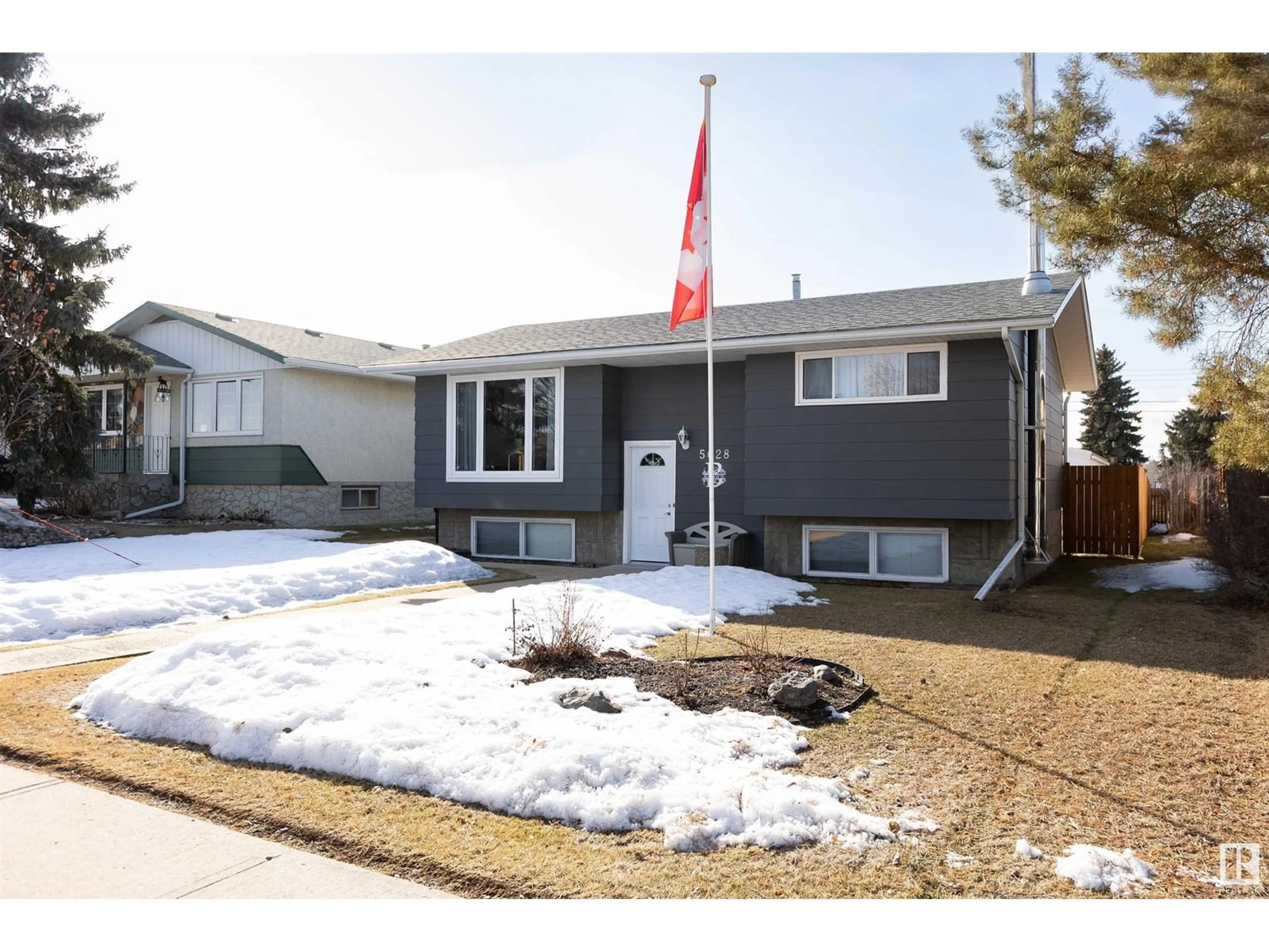 Home with vinyl exterior material, street for 5028 43A ST, Barrhead Alberta T7N1J5