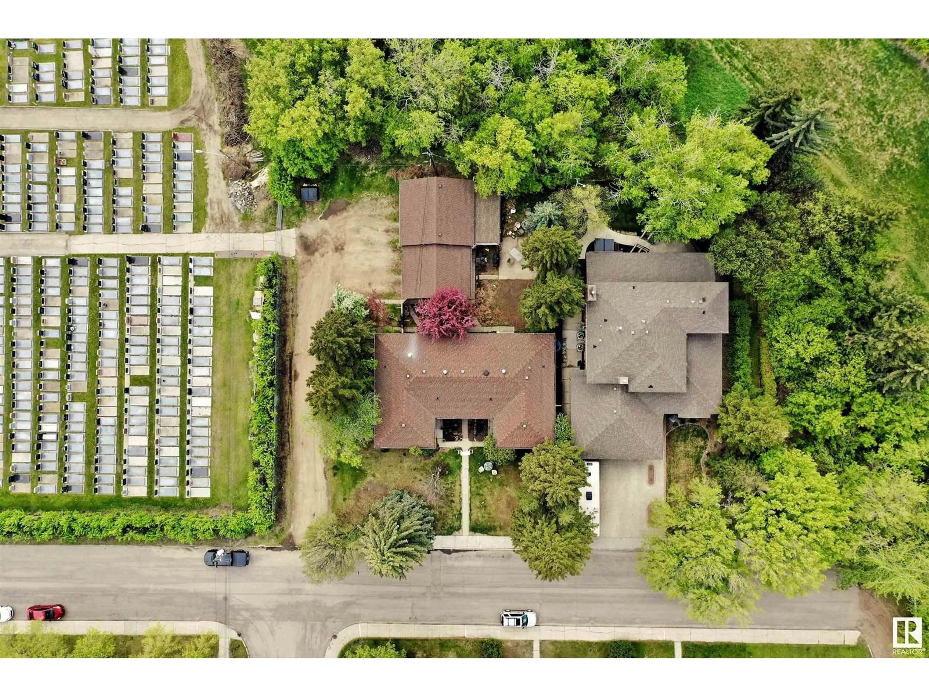 A pic from outside/outdoor area/front of a property/back of a property/a pic from drone, street for 10202 76 ST, Edmonton Alberta T6A3A6