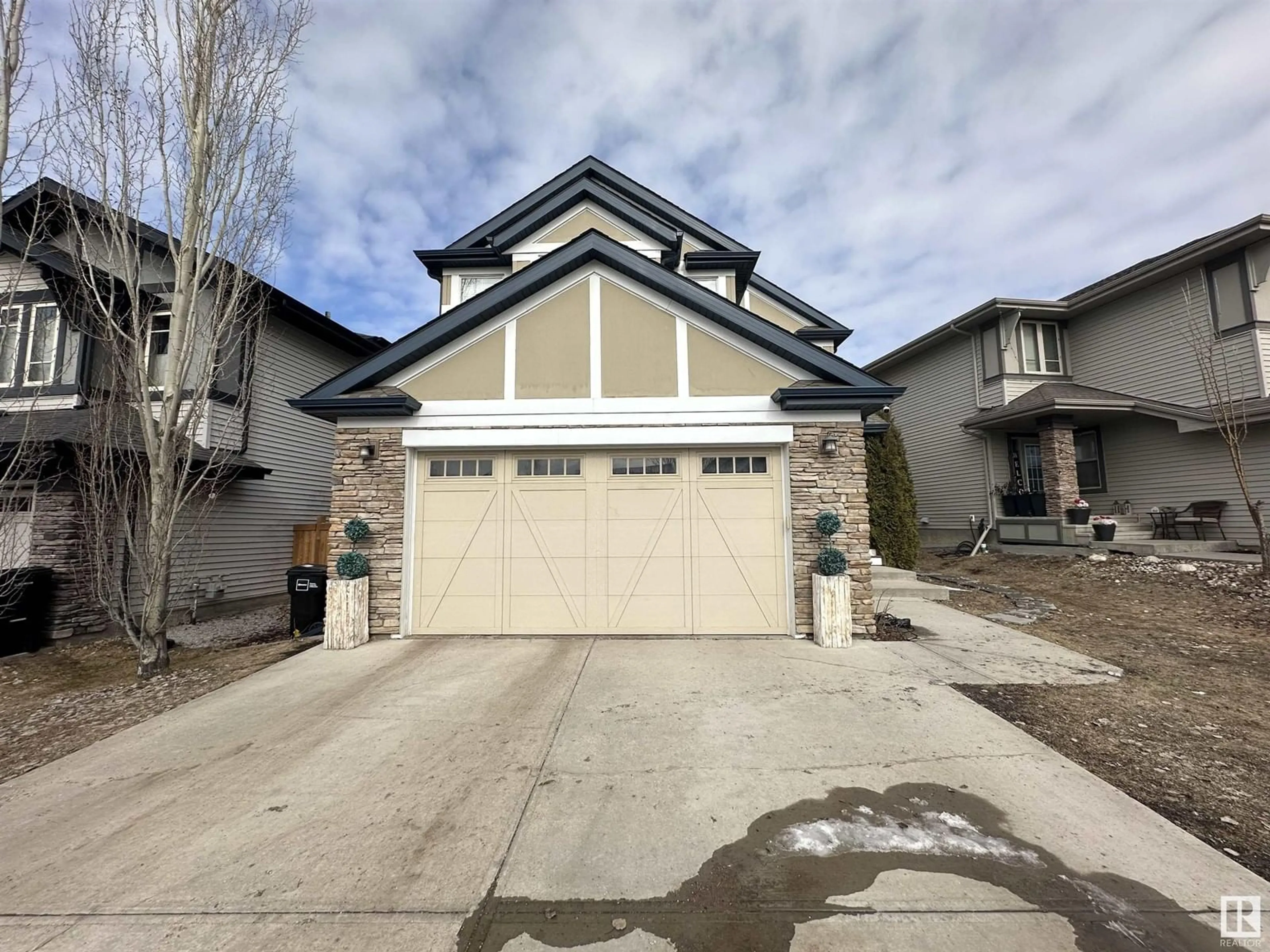 Home with vinyl exterior material, street for 1044 ARMITAGE CR SW, Edmonton Alberta T6W0K8