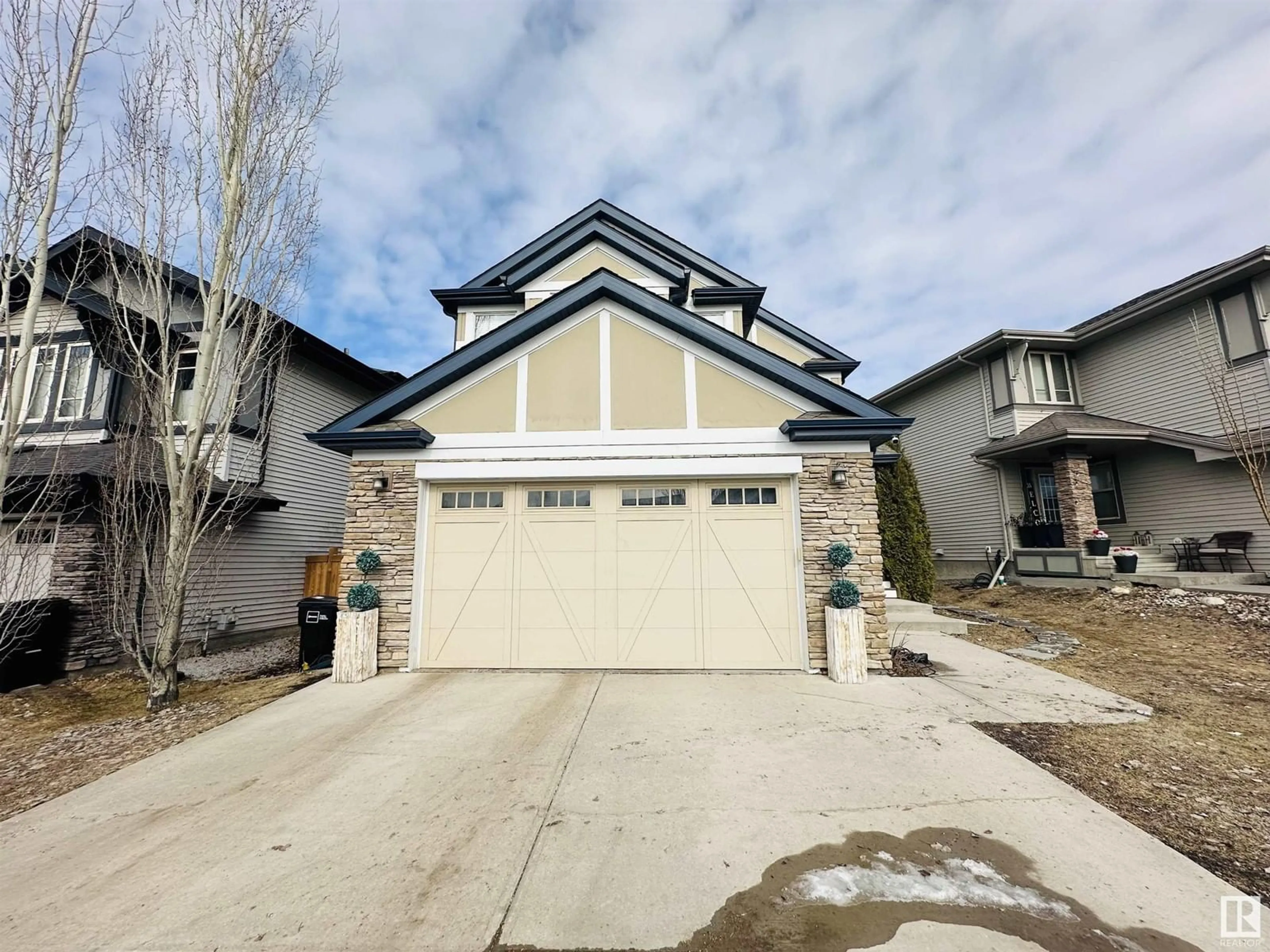 Home with vinyl exterior material, street for 1044 ARMITAGE CR SW, Edmonton Alberta T6W0K8