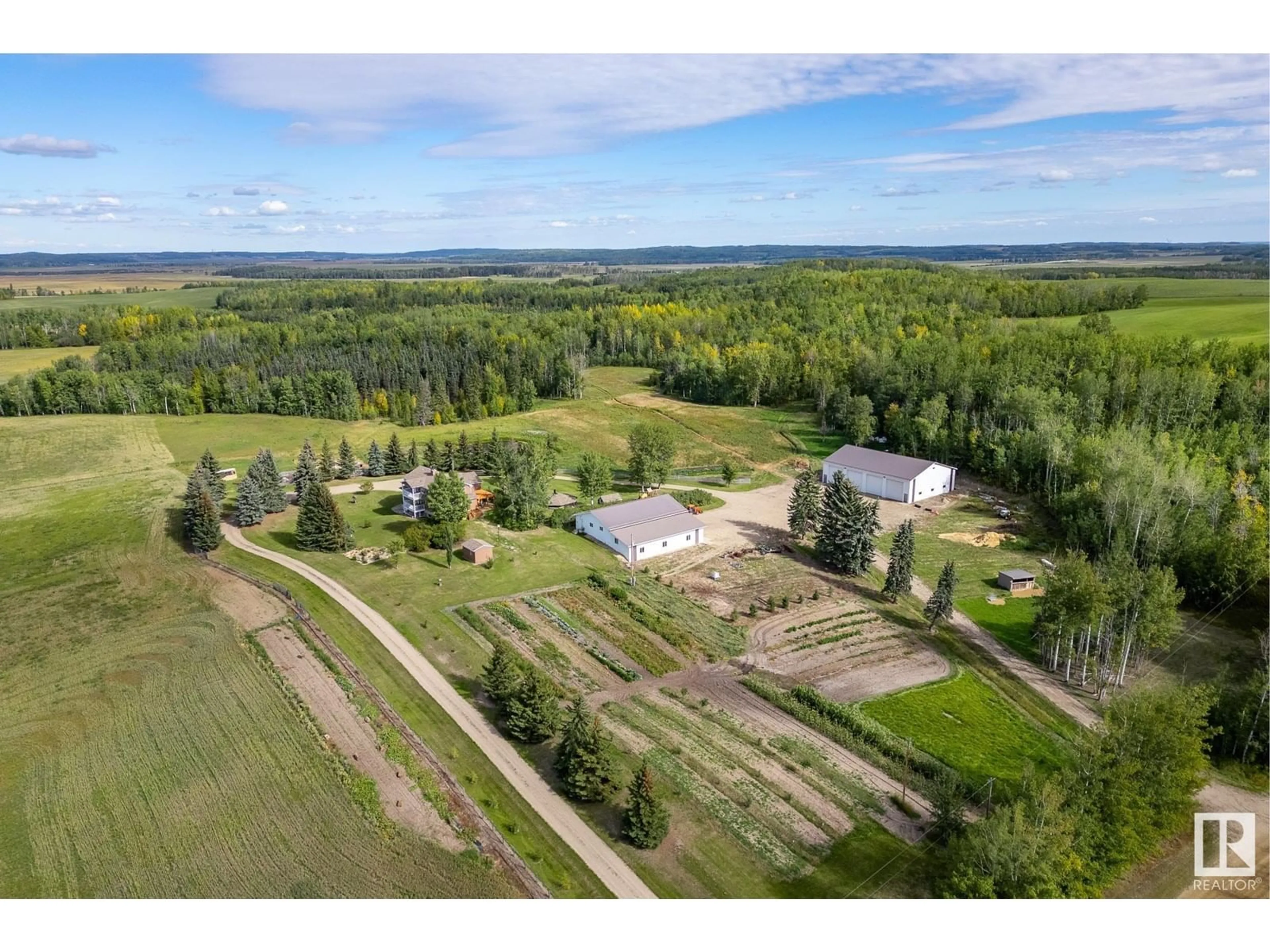 A pic from outside/outdoor area/front of a property/back of a property/a pic from drone, forest/trees view for 5132 TWP ROAD 505, Rural Parkland County Alberta T0E2H0