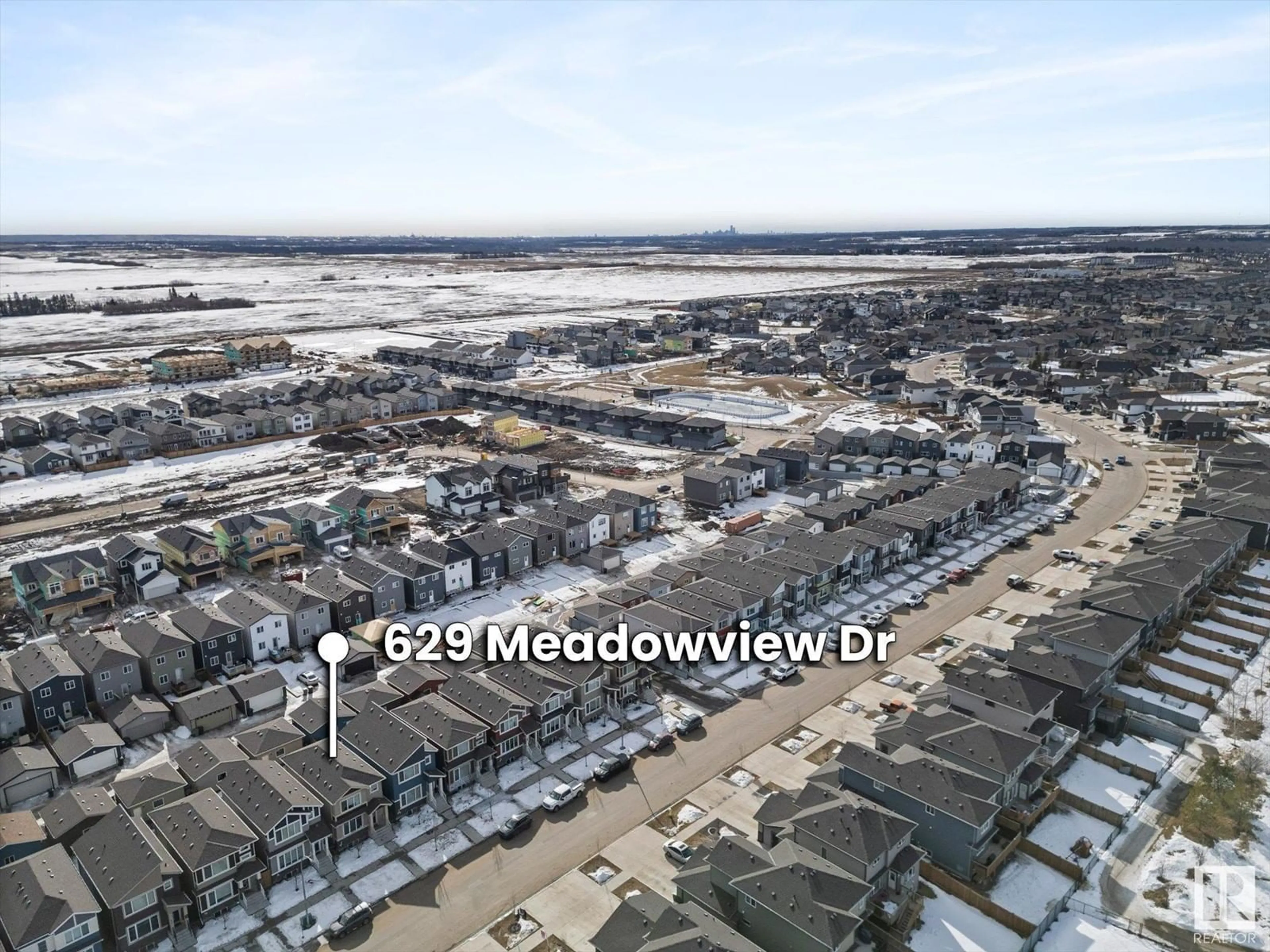 A pic from outside/outdoor area/front of a property/back of a property/a pic from drone, mountain view for 629 Meadowview Drive, Fort Saskatchewan Alberta T8L0X2