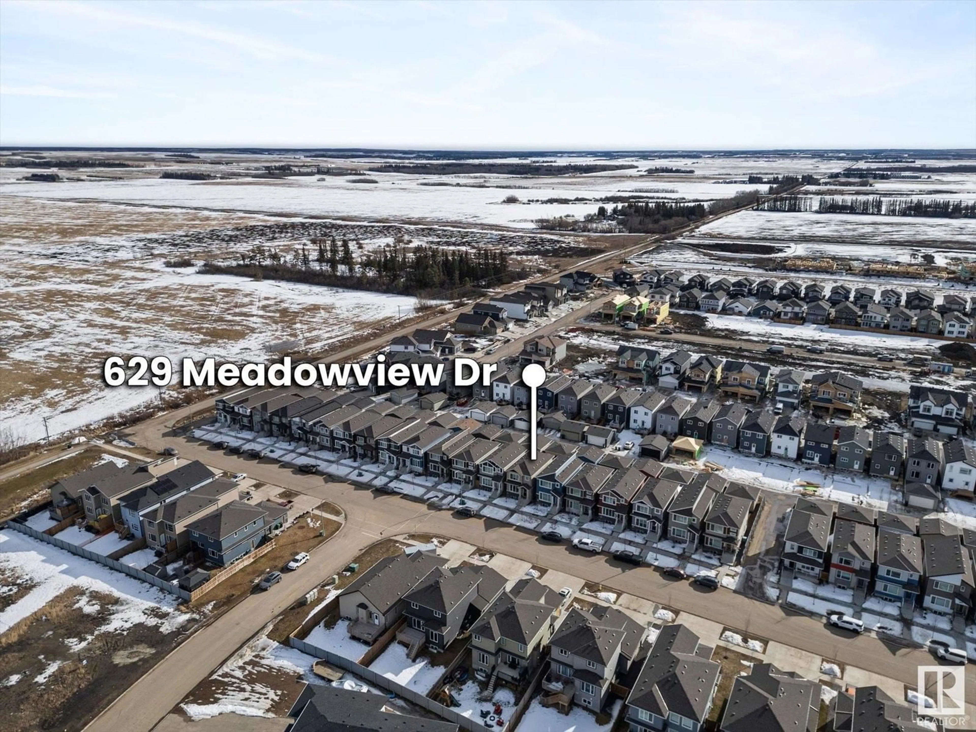 A pic from outside/outdoor area/front of a property/back of a property/a pic from drone, mountain view for 629 Meadowview Drive, Fort Saskatchewan Alberta T8L0X2